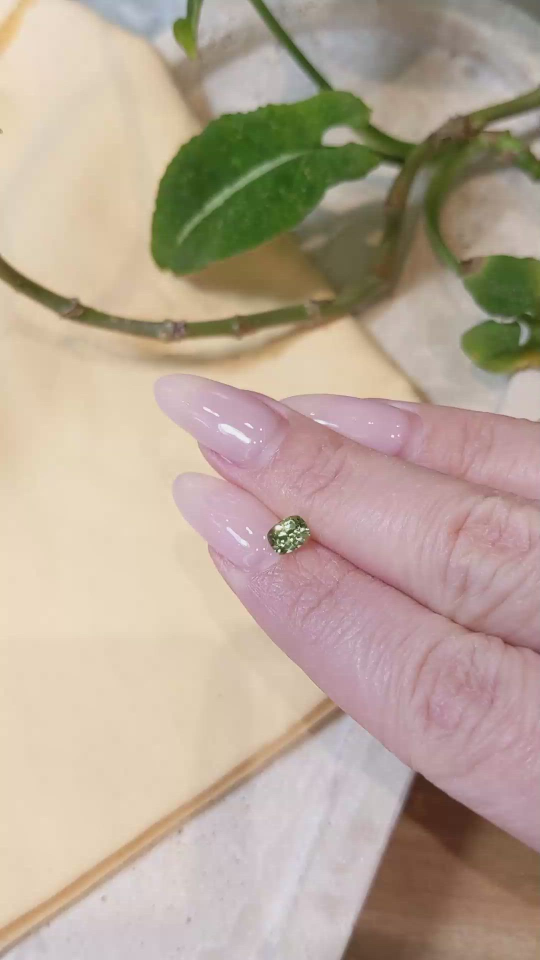 0.60 Ct. Yellowish Green Sapphire from Montana Size Video
