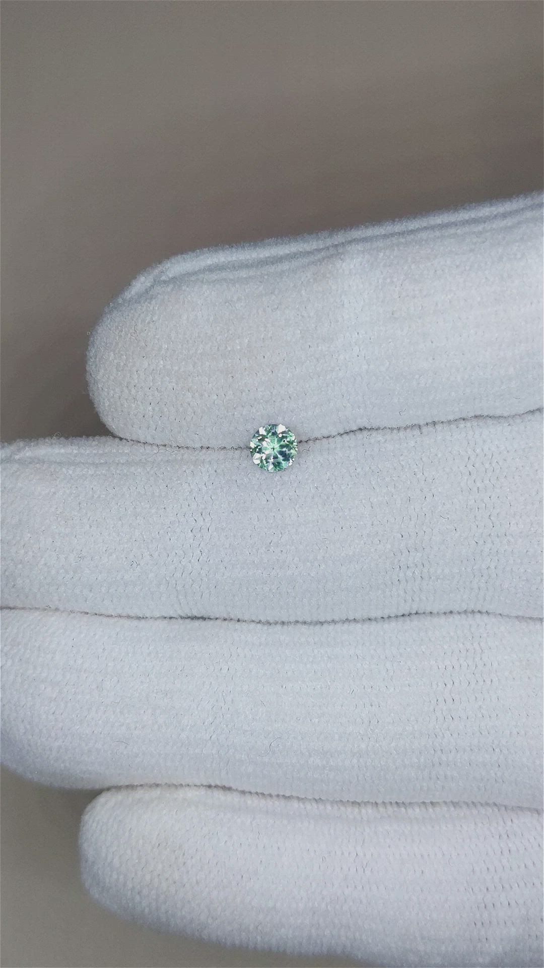 0.27 Ct. Yellowish Green Sapphire from Montana Size Video