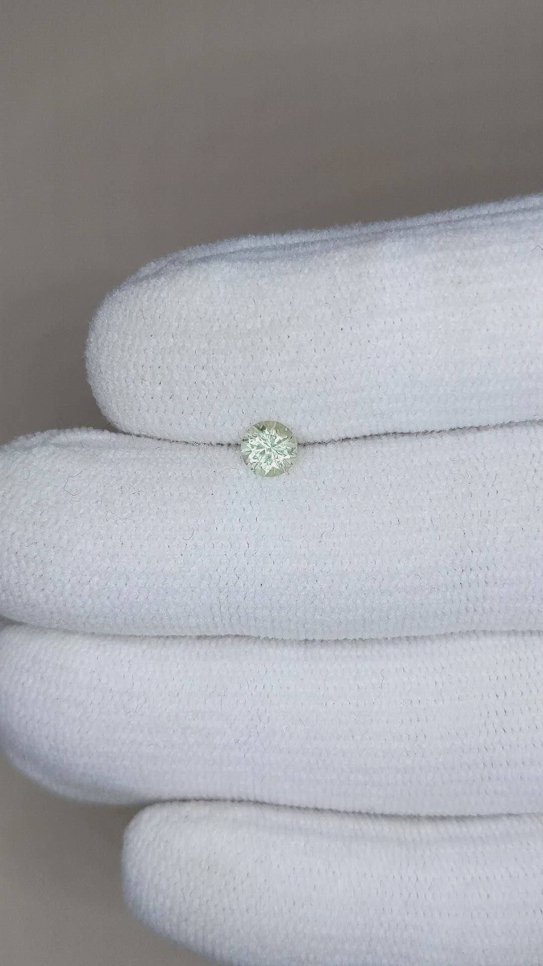 0.42 Ct. Yellowish Green Sapphire from Montana Size Video