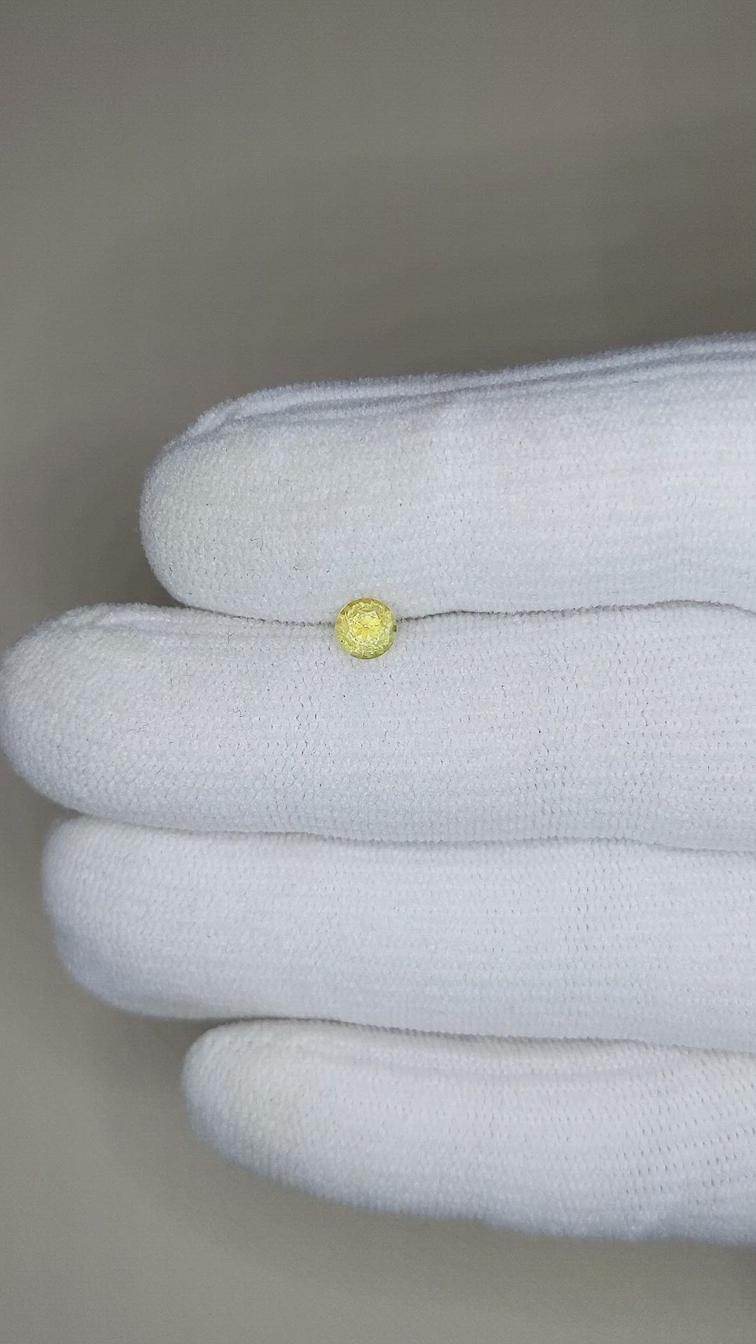 0.42 Ct. Yellow Sapphire from Montana Size Video