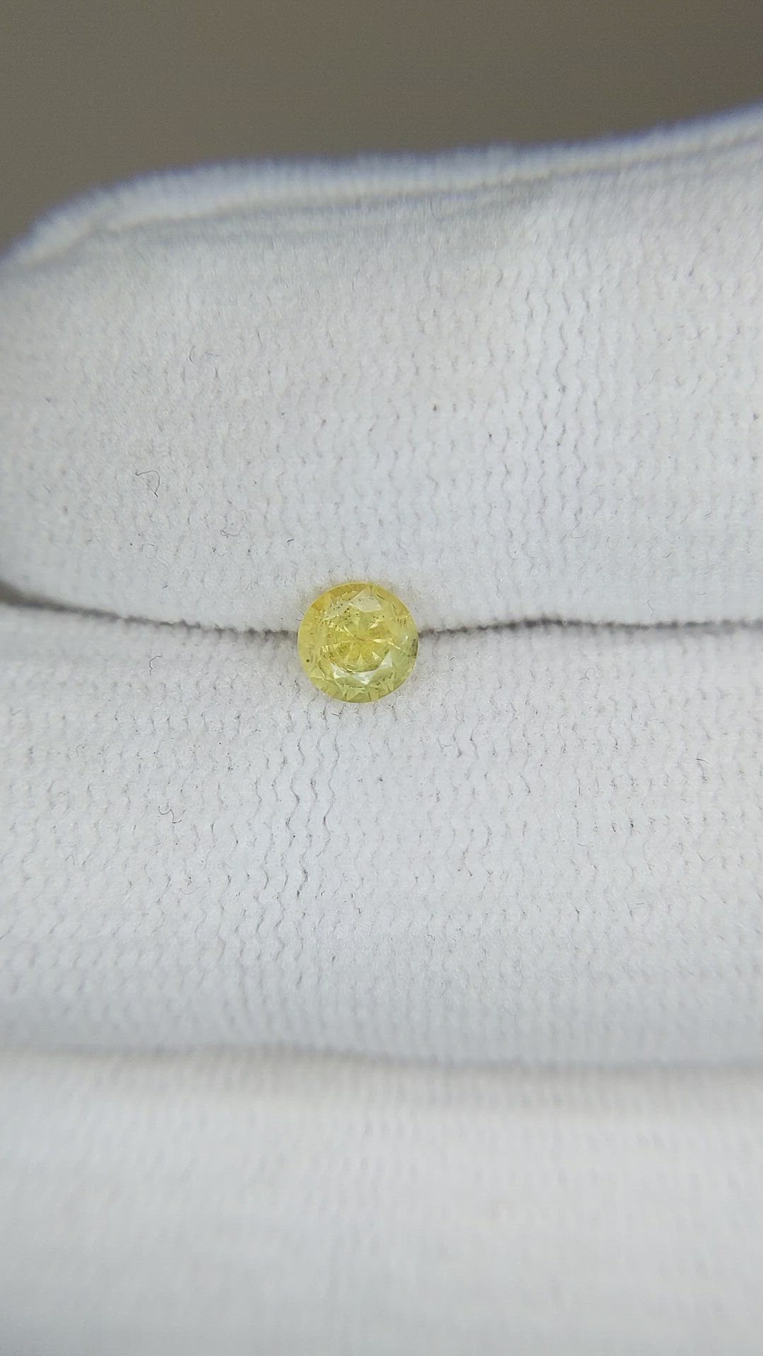 0.42 Ct. Yellow Sapphire from Montana Size Video