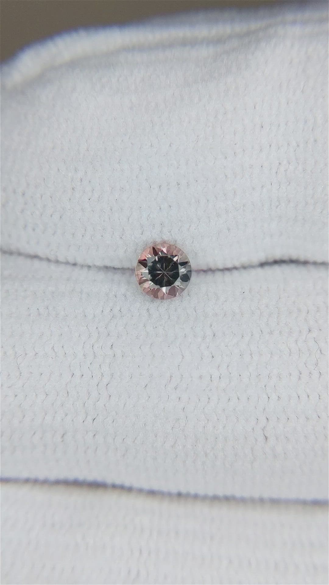 0.34 Ct. Pinkish Brown Sapphire from Montana Size Video