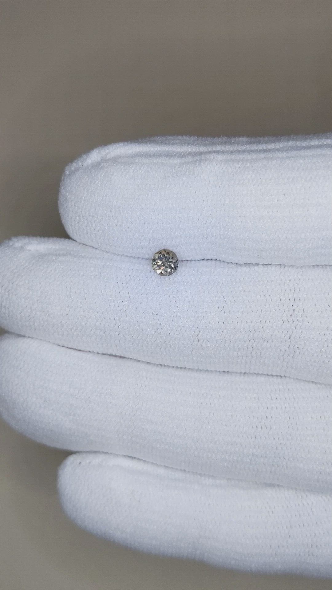0.34 Ct. Pinkish Brown Sapphire from Montana Size Video