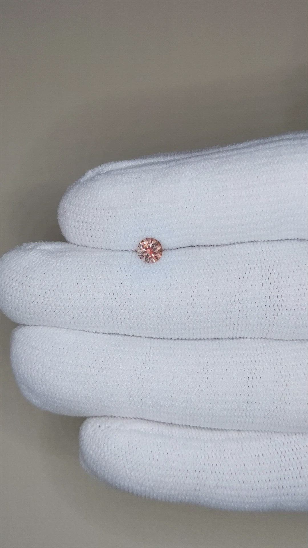 0.38 Ct. Pinkish Brown Sapphire from Montana Size Video