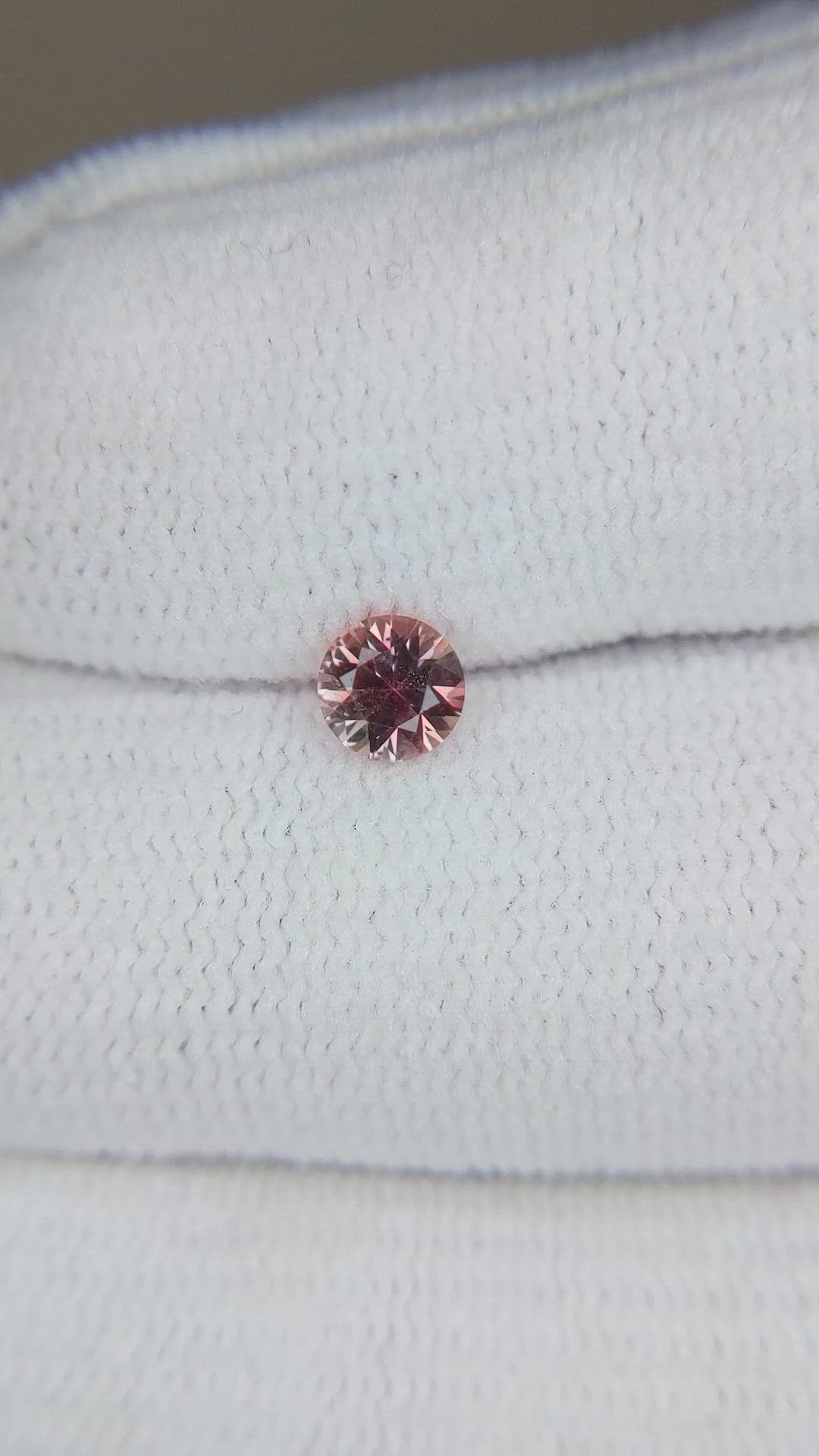 0.38 Ct. Pinkish Brown Sapphire from Montana Size Video