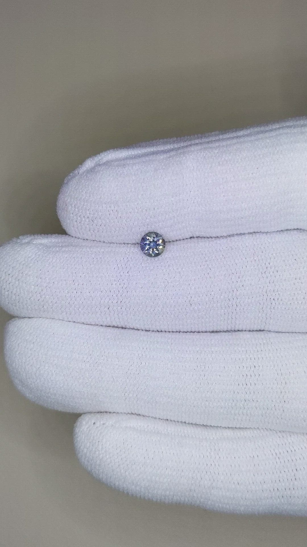 0.39 Ct. Purple Sapphire from Montana Size Video