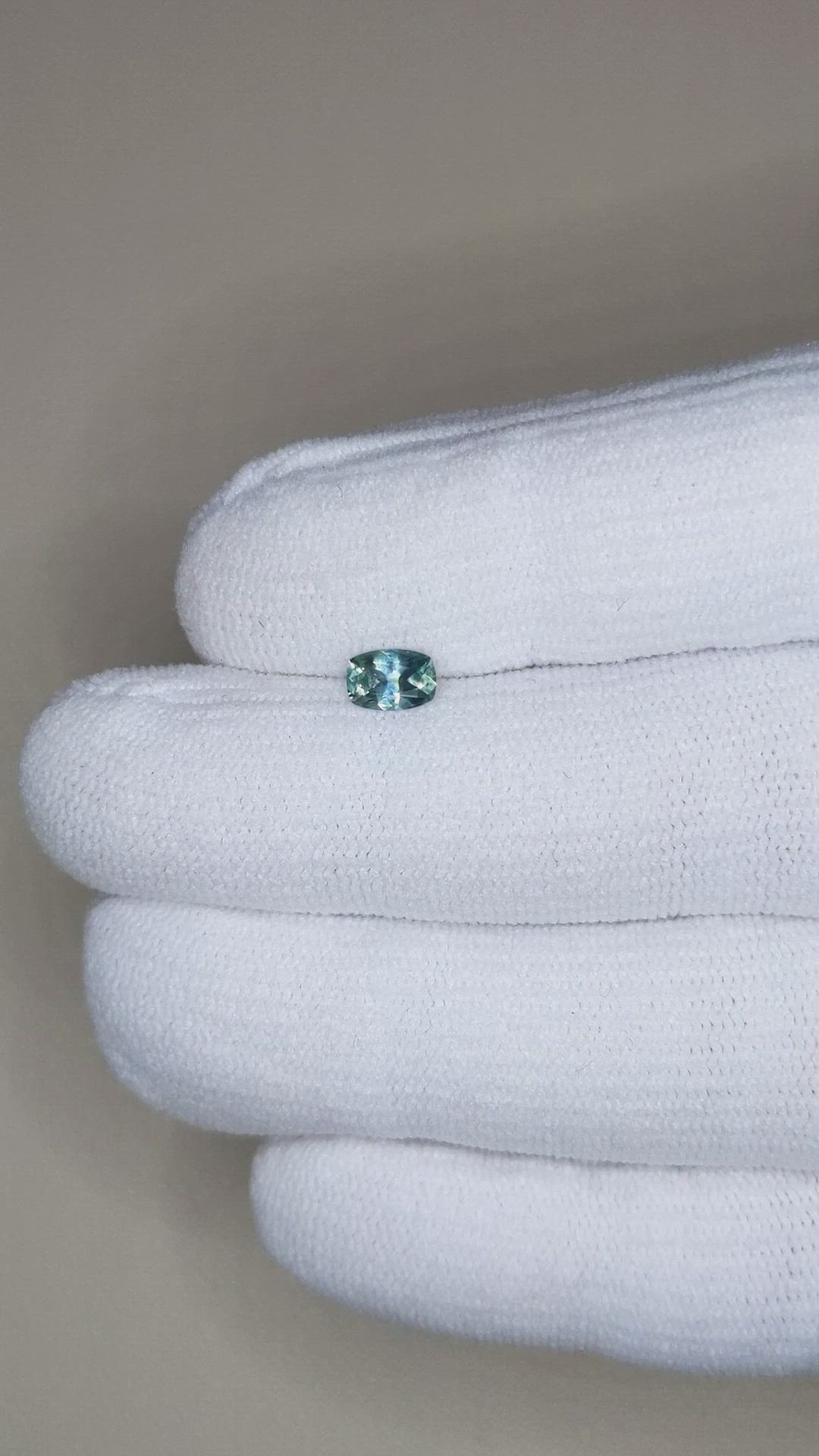 0.48 Ct. Bluish Green Sapphire from Montana Size Video
