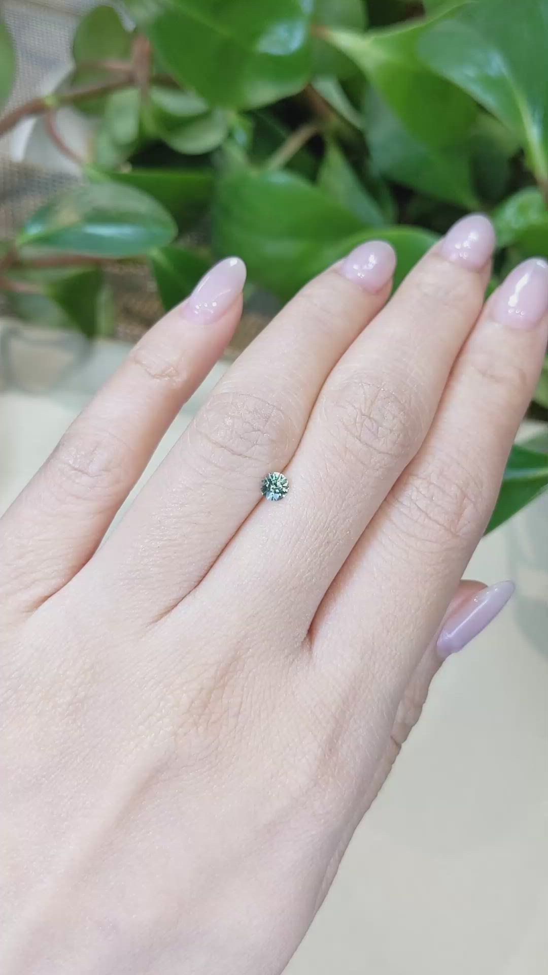 0.30 Ct. Yellowish Green Sapphire from Montana Size Video