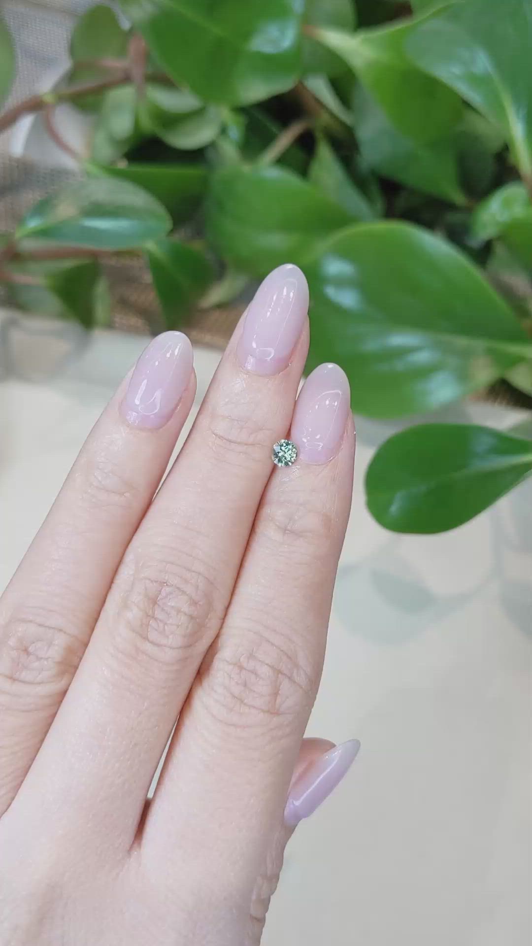 0.30 Ct. Yellowish Green Sapphire from Montana Size Video