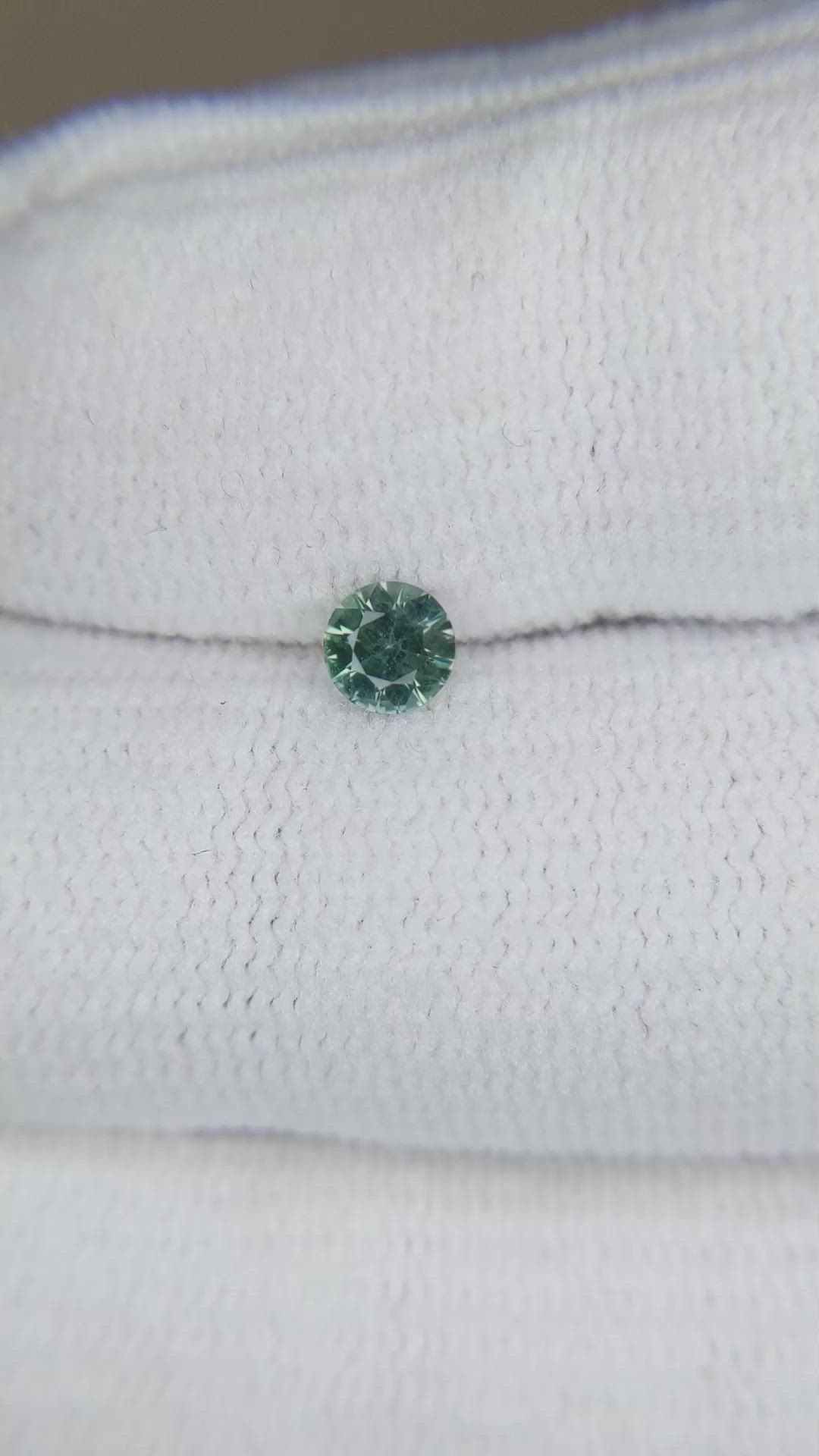 0.28 Ct. Bluish Green Sapphire from Montana Size Video