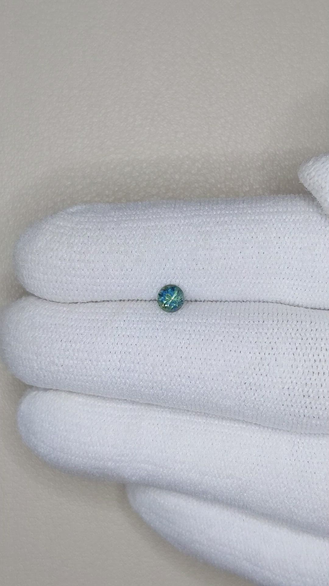 0.28 Ct. Bluish Green Sapphire from Montana Size Video
