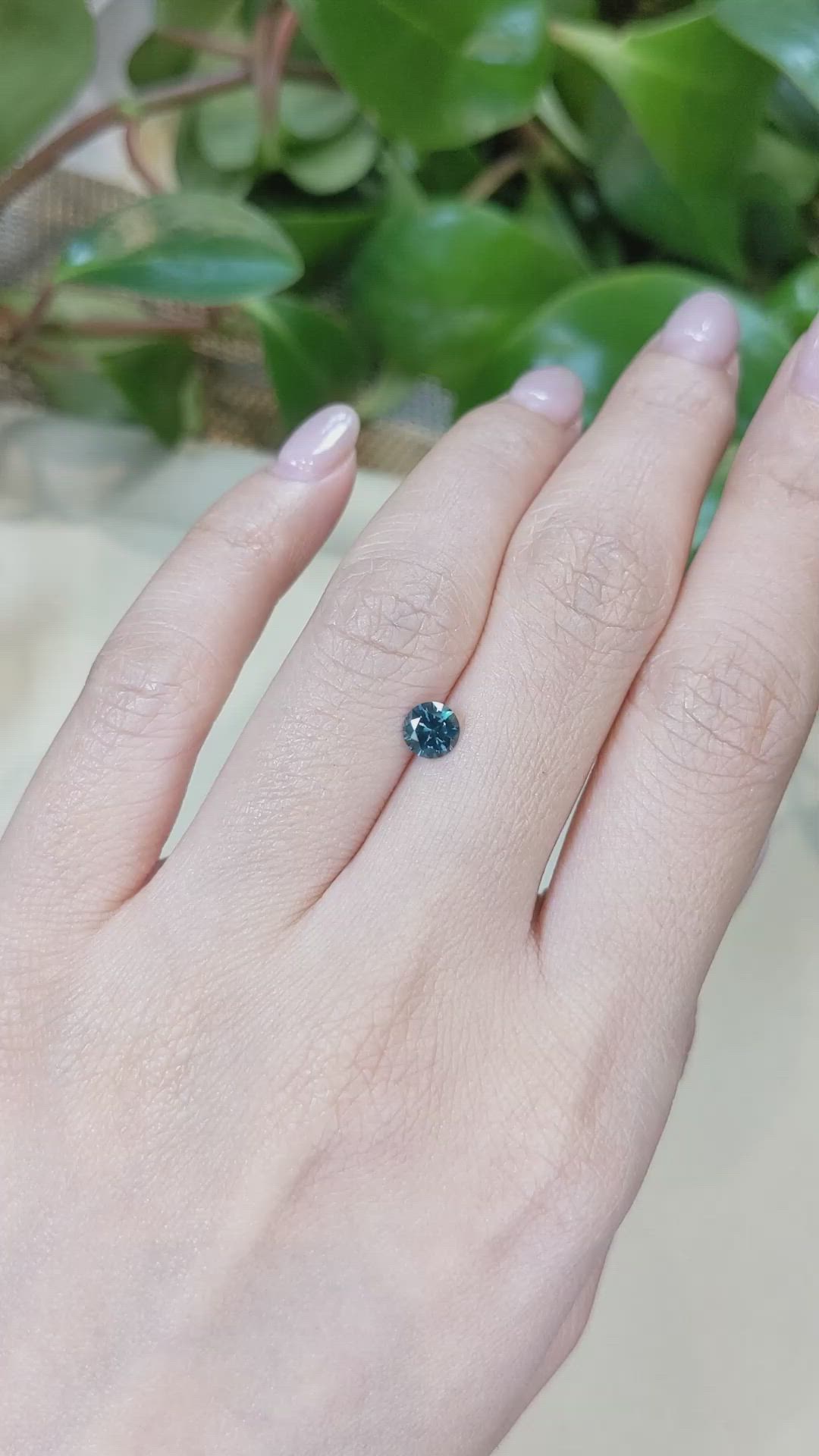 0.62 Ct. Bluish Green Sapphire from Montana Size Video