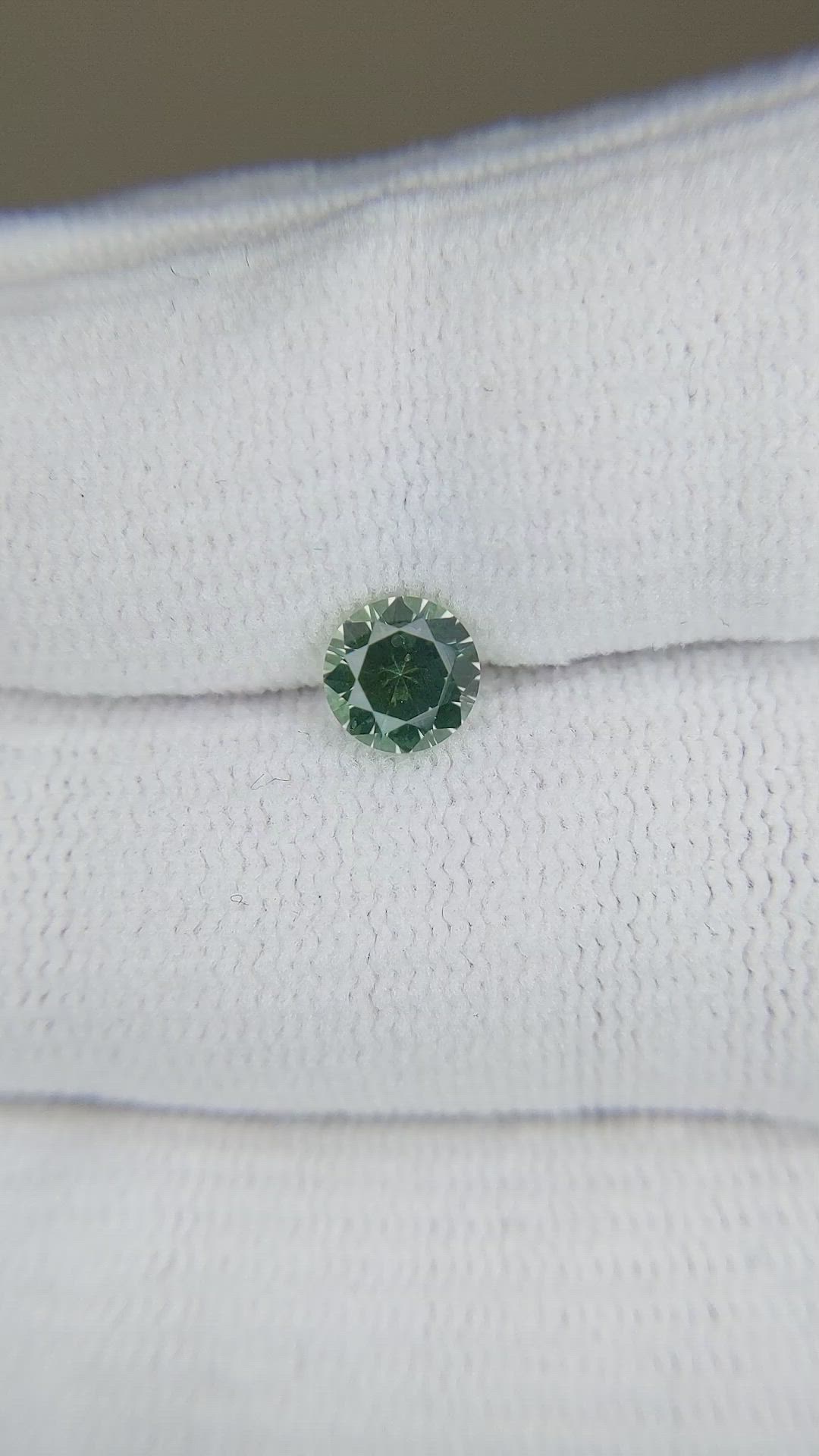 0.90 Ct. Yellowish Green Sapphire from Montana Size Video