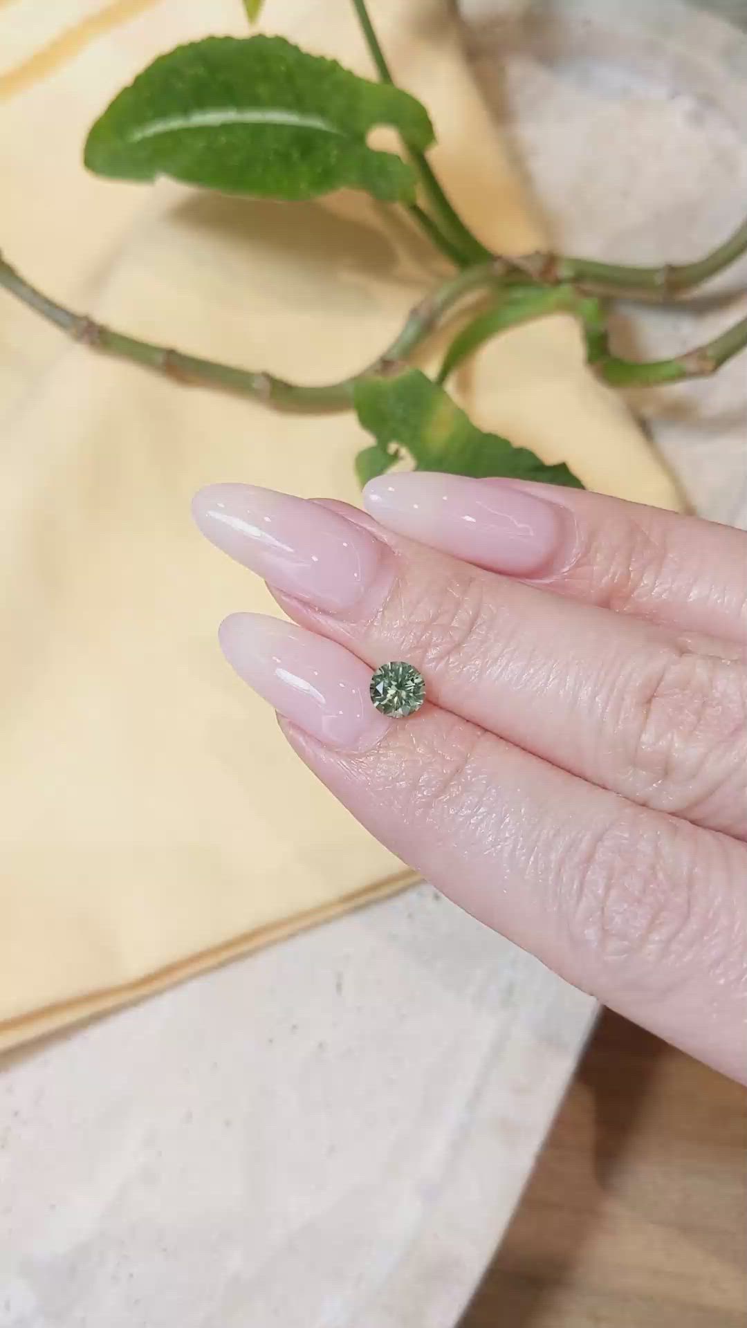 0.90 Ct. Yellowish Green Sapphire from Montana Size Video