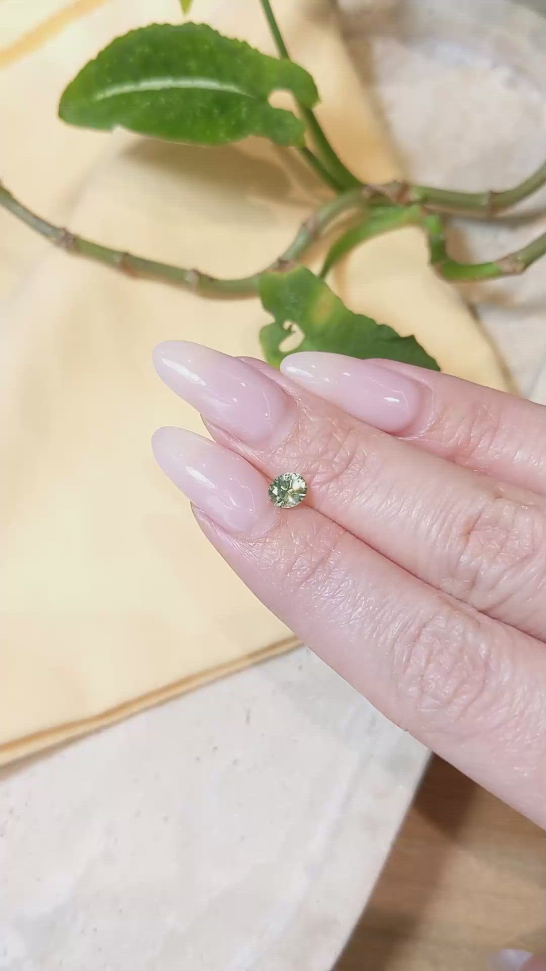 0.57 Ct. Yellowish Green Sapphire from Montana Size Video