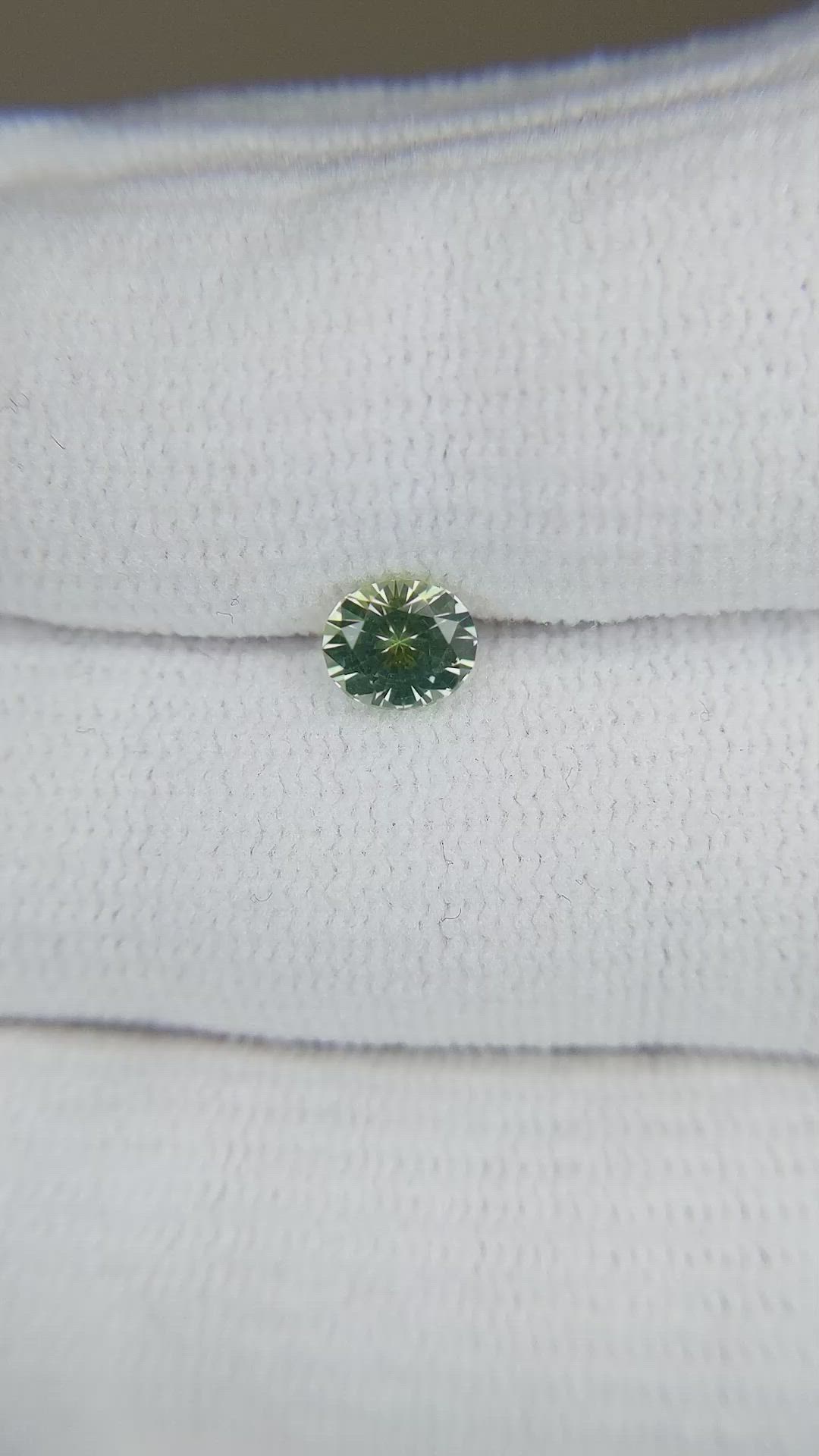 0.57 Ct. Yellowish Green Sapphire from Montana Size Video