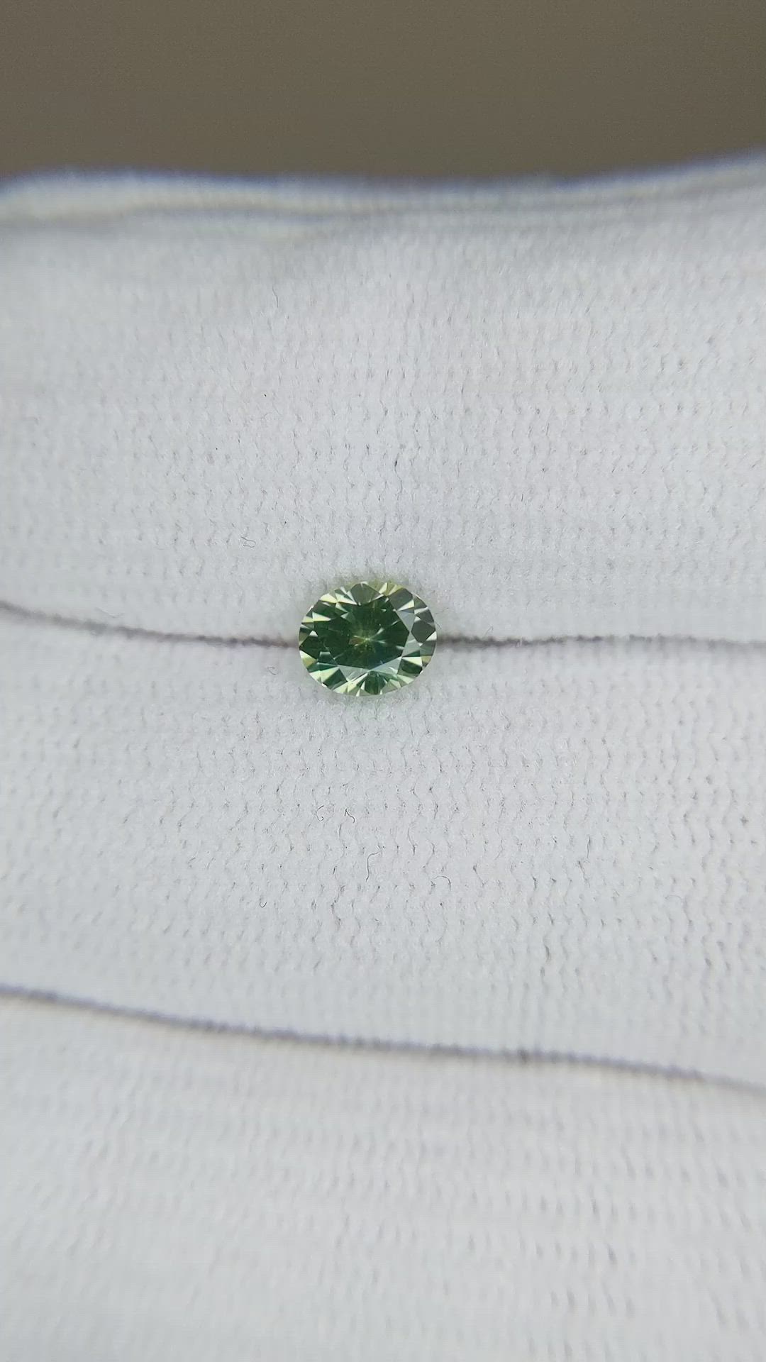 0.64 Ct. Yellowish Green Sapphire from Montana Size Video