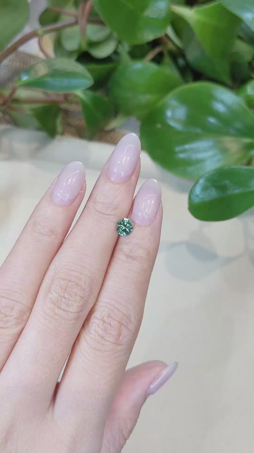 0.89 Ct. Yellowish Green Sapphire from Montana Size Video