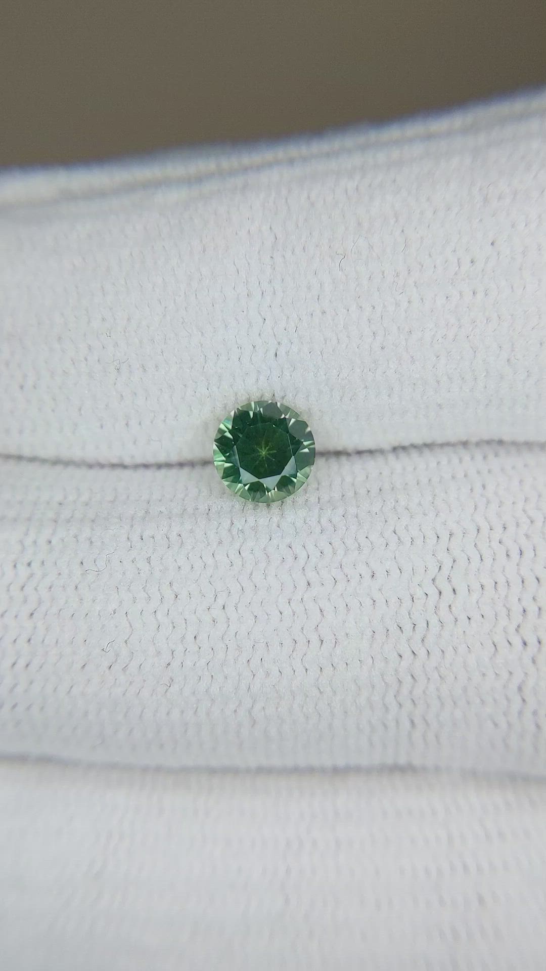 0.89 Ct. Yellowish Green Sapphire from Montana Size Video