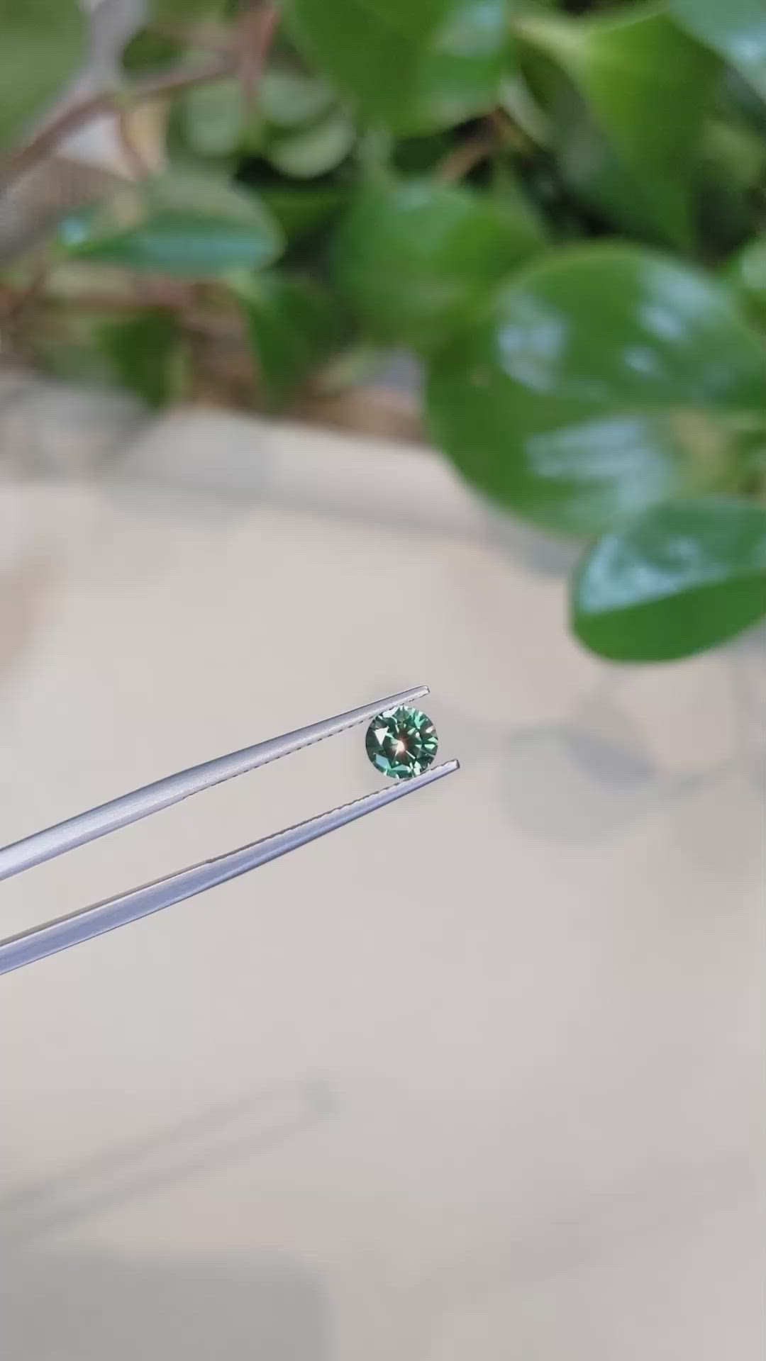 0.89 Ct. Yellowish Green Sapphire from Montana Size Video