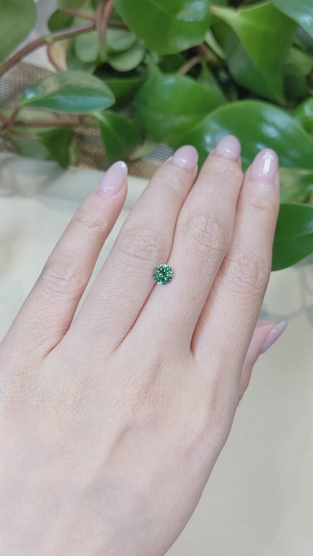 0.89 Ct. Yellowish Green Sapphire from Montana Size Video