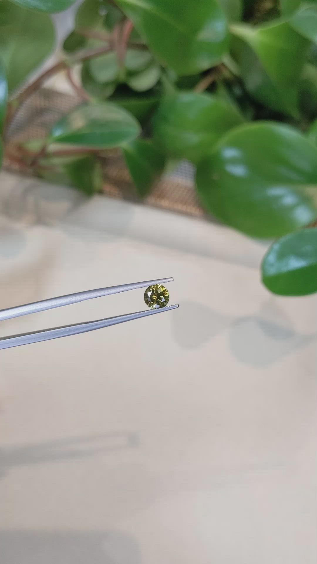 0.79 Ct. Greenish Yellow Sapphire from Montana Size Video