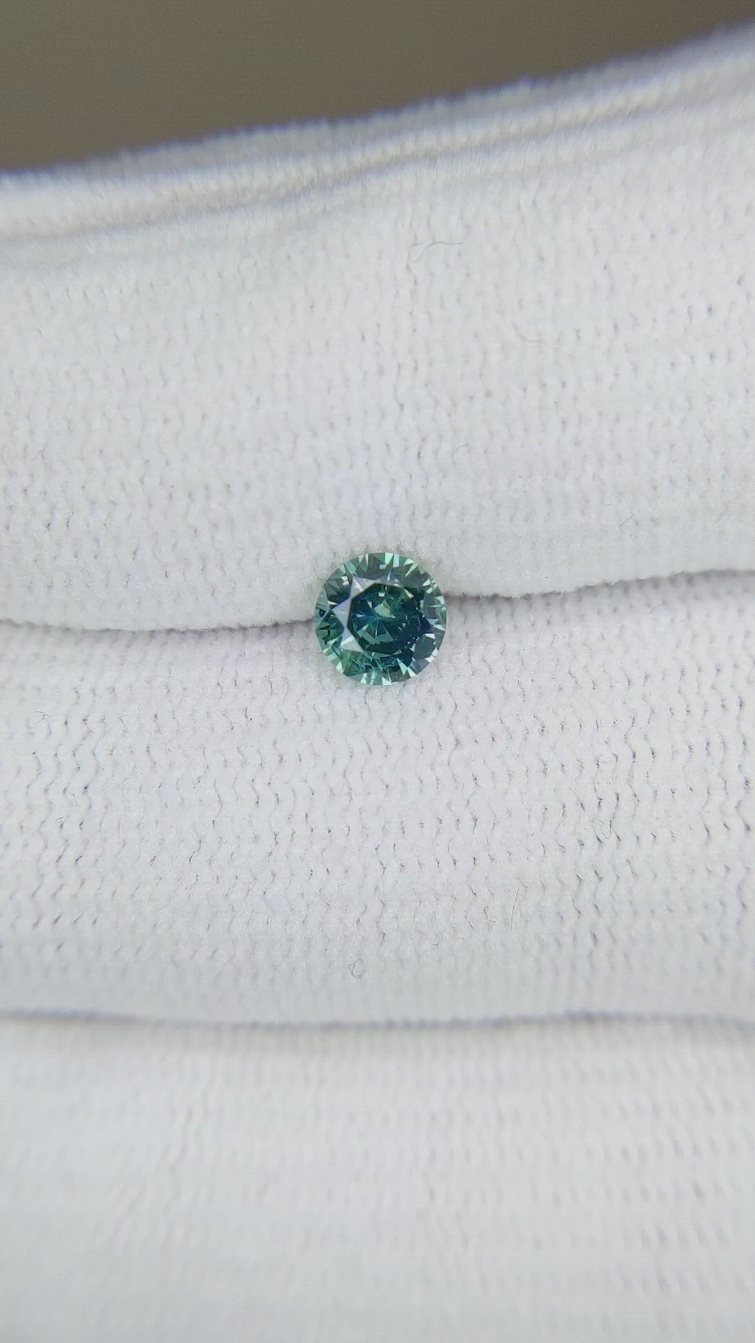 0.59 Ct. Bluish Green Sapphire from Montana Size Video