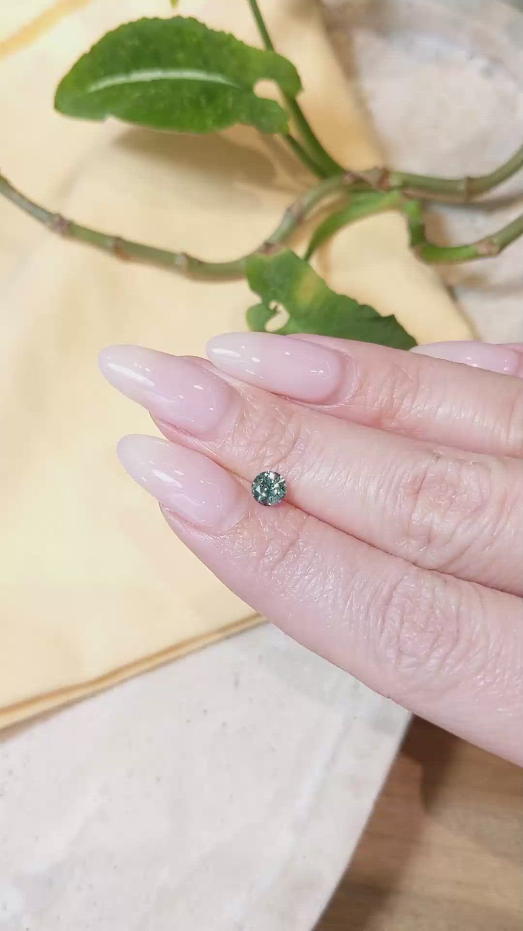 0.59 Ct. Bluish Green Sapphire from Montana Size Video