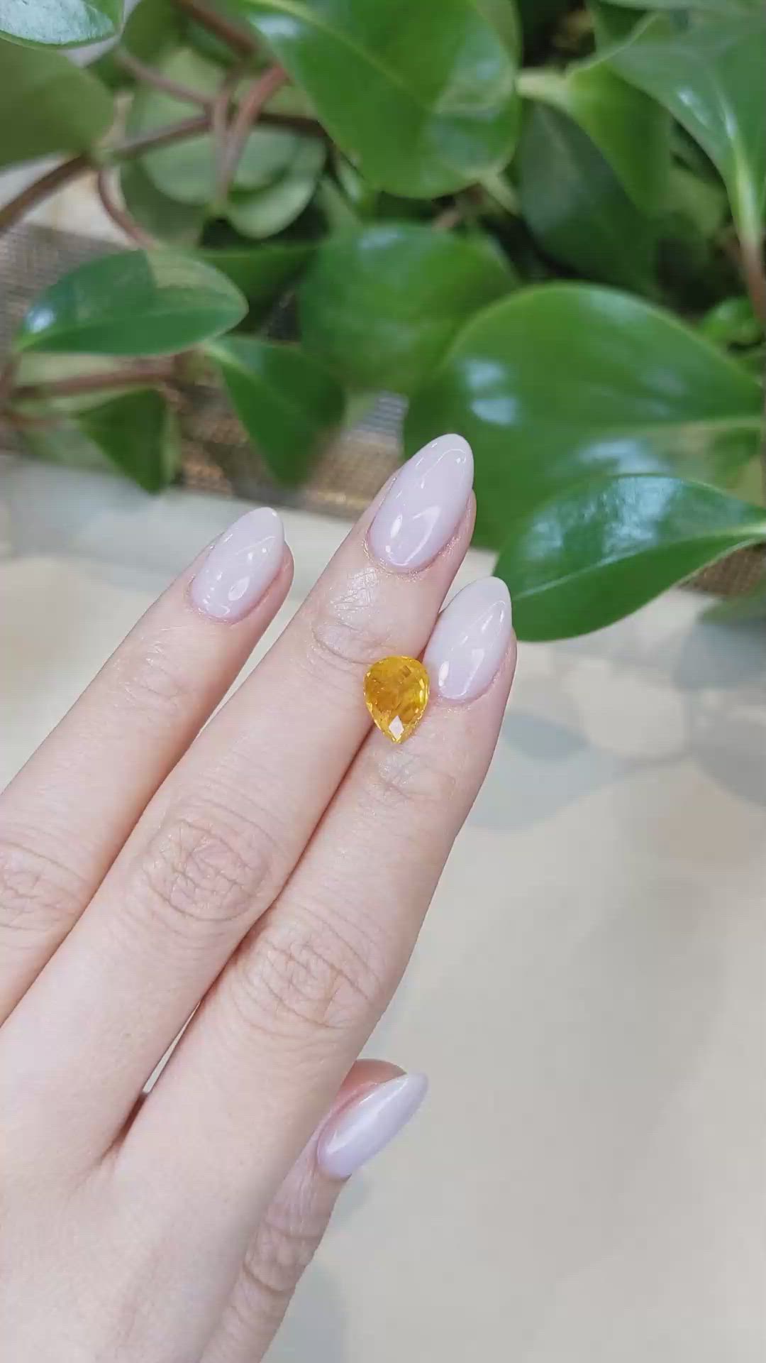 2.84 Ct. Orange Sapphire from Ceylon (Sri Lanka) Size Video