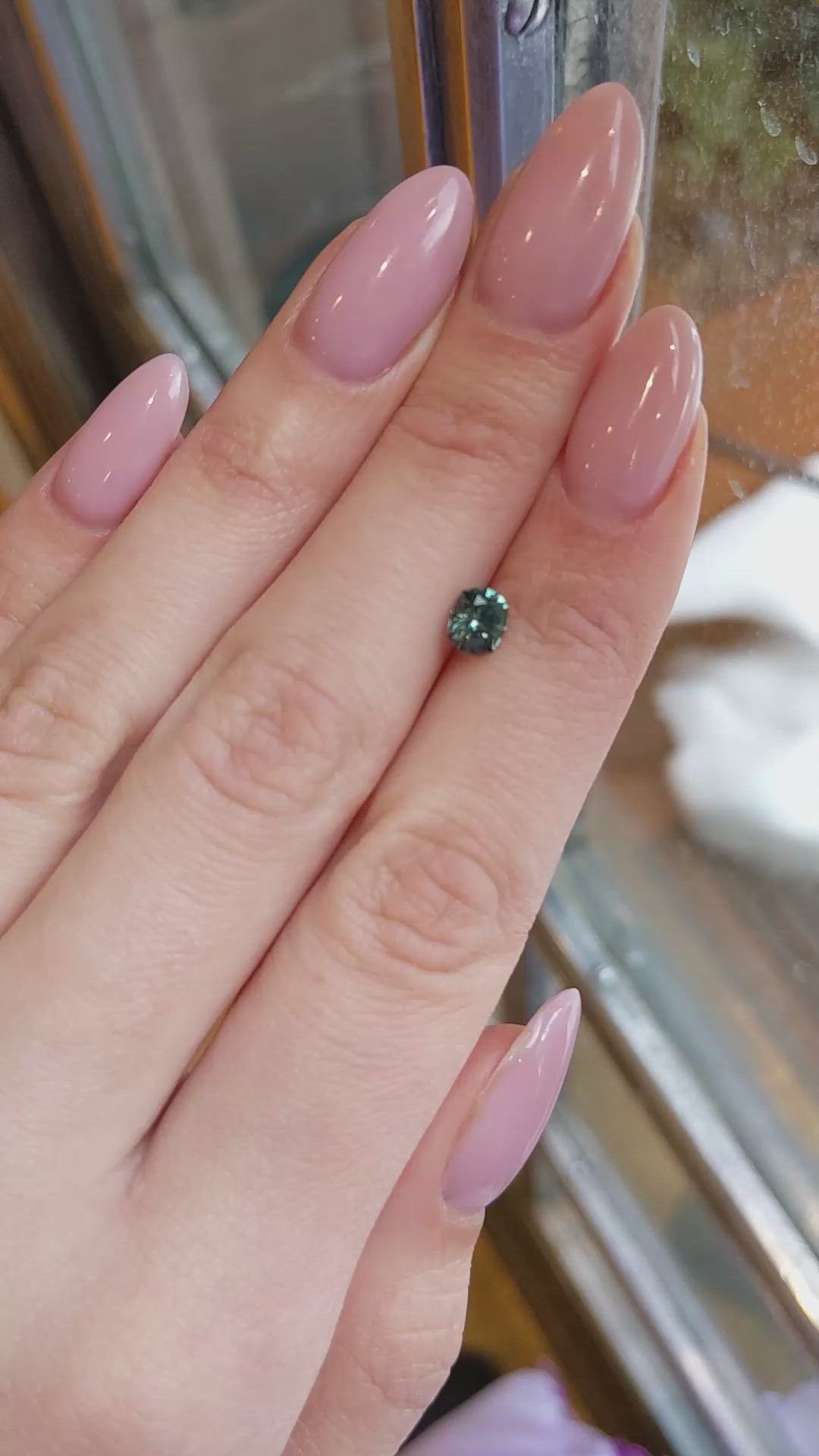 0.83 Ct. Green Sapphire from Montana Size Video