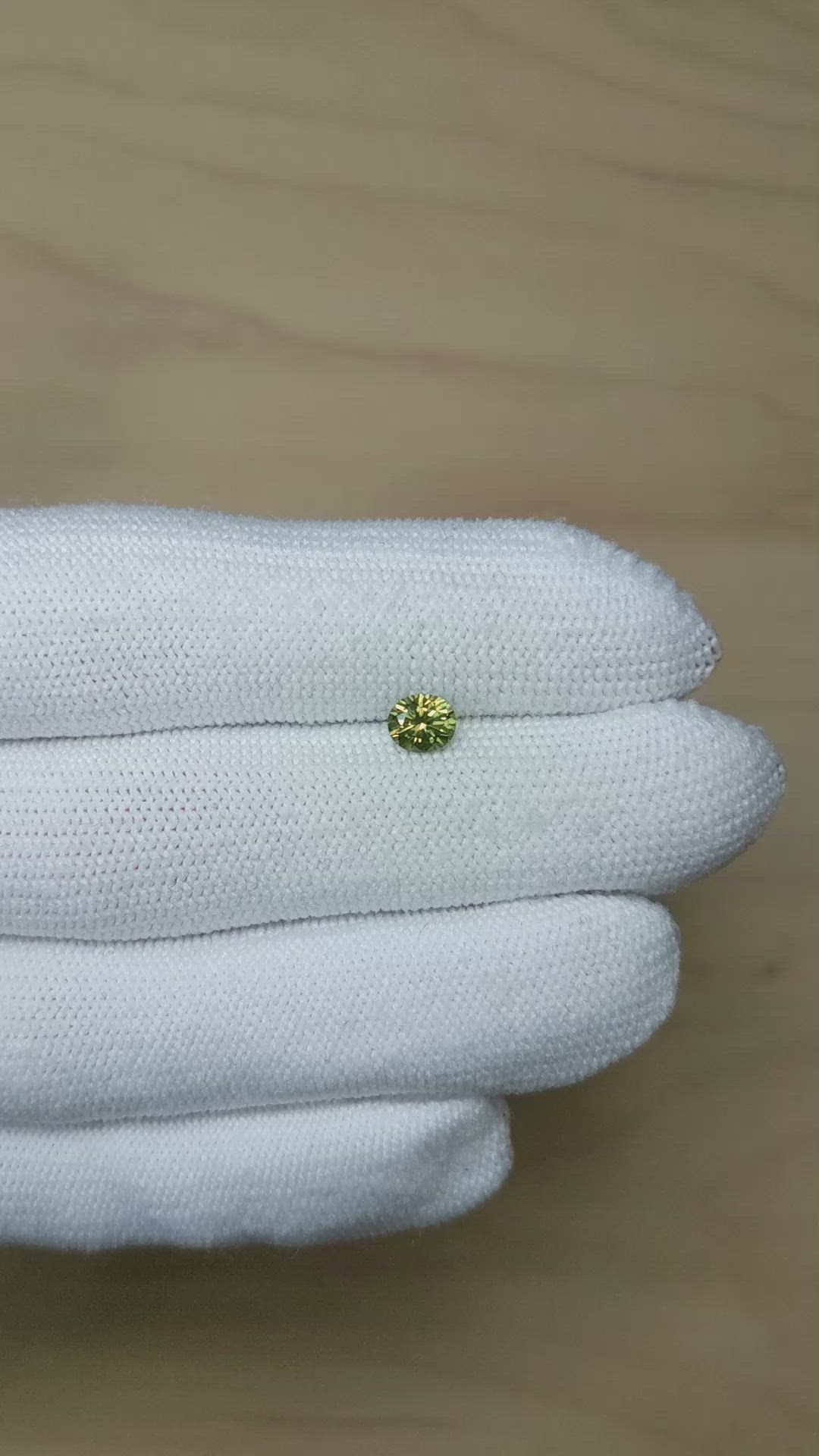 0.74 Ct. Yellowish Green Sapphire from Montana Size Video