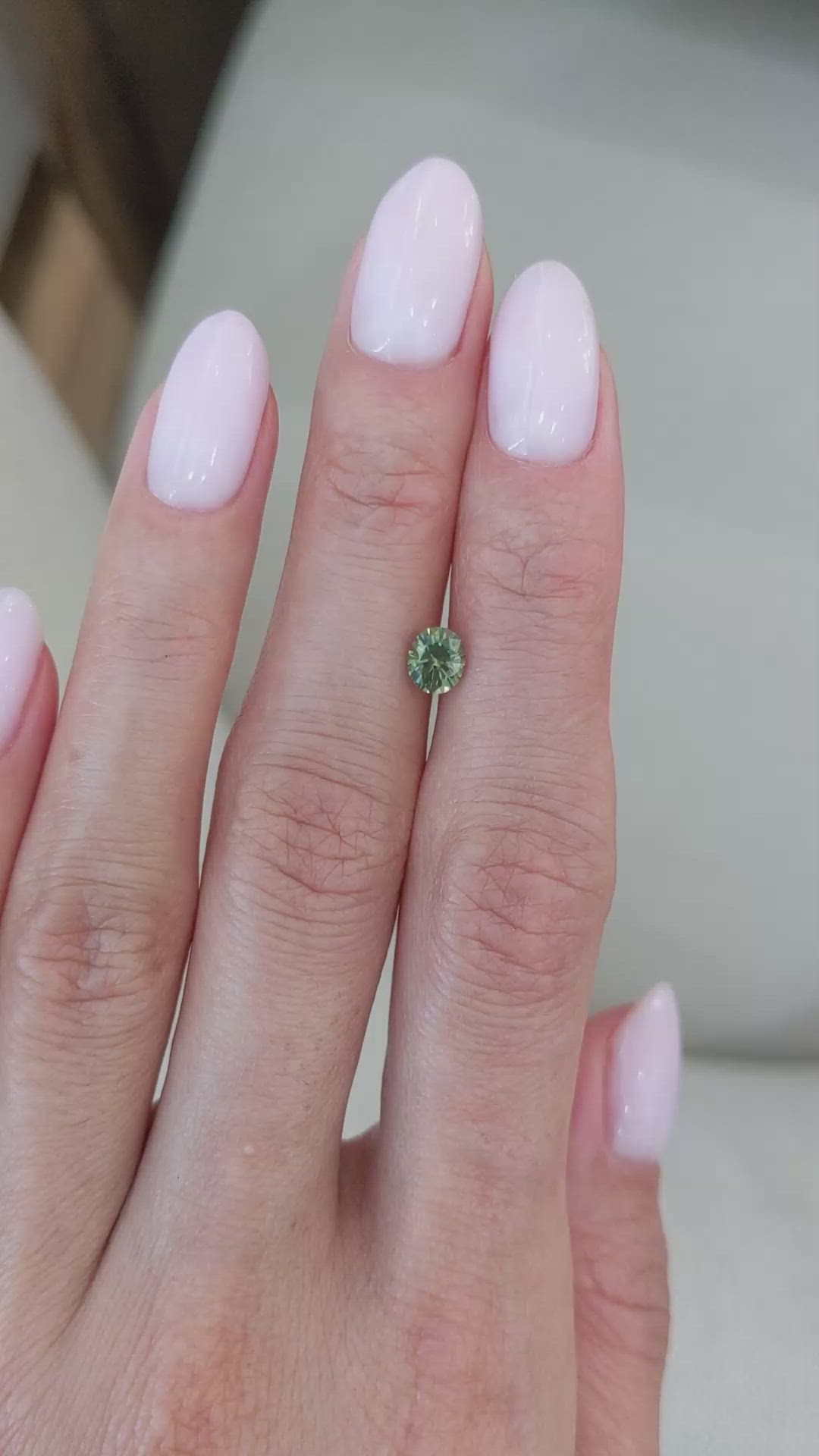 0.74 Ct. Yellowish Green Sapphire from Montana Size Video