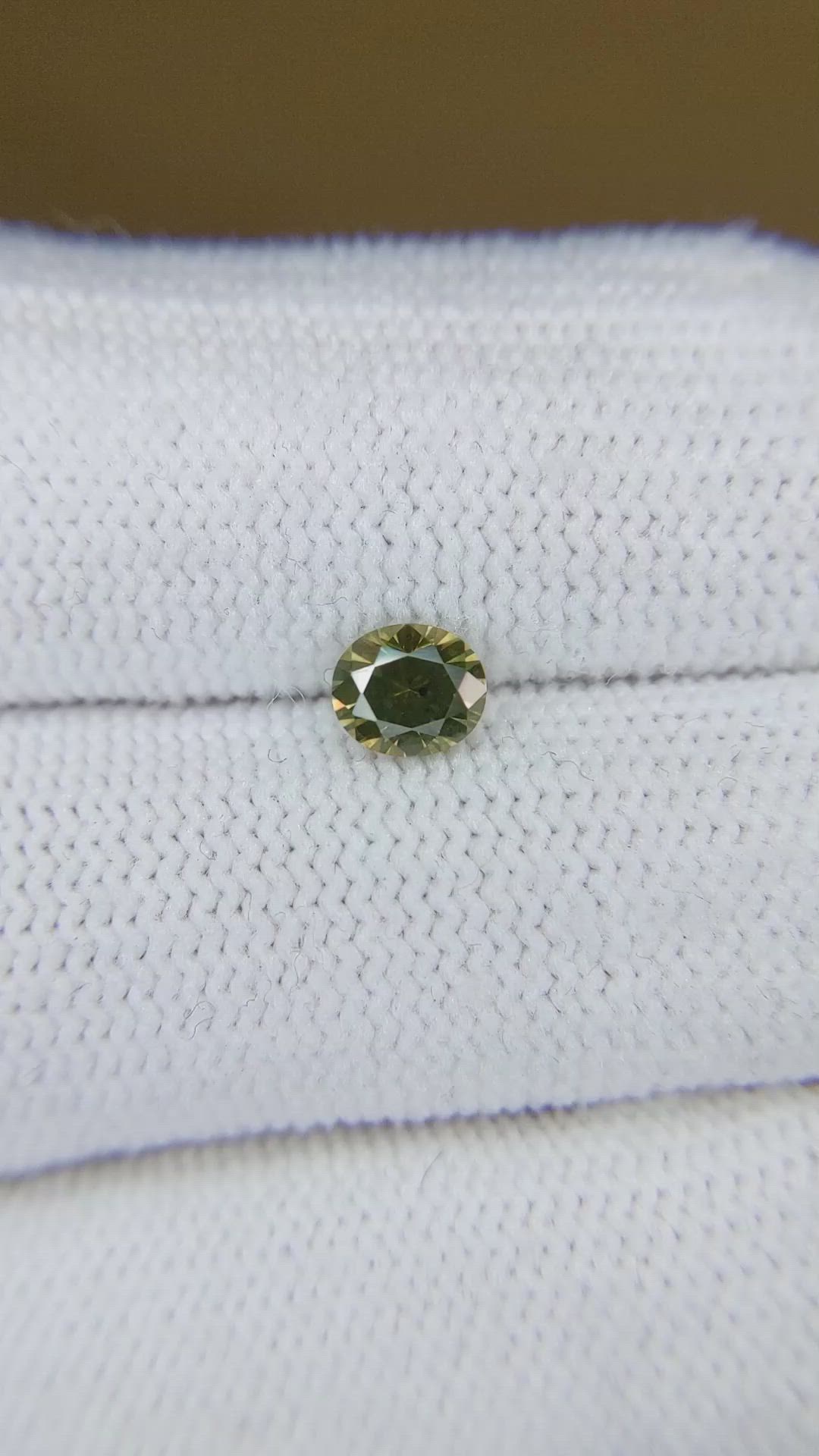 0.74 Ct. Yellowish Green Sapphire from Montana Size Video