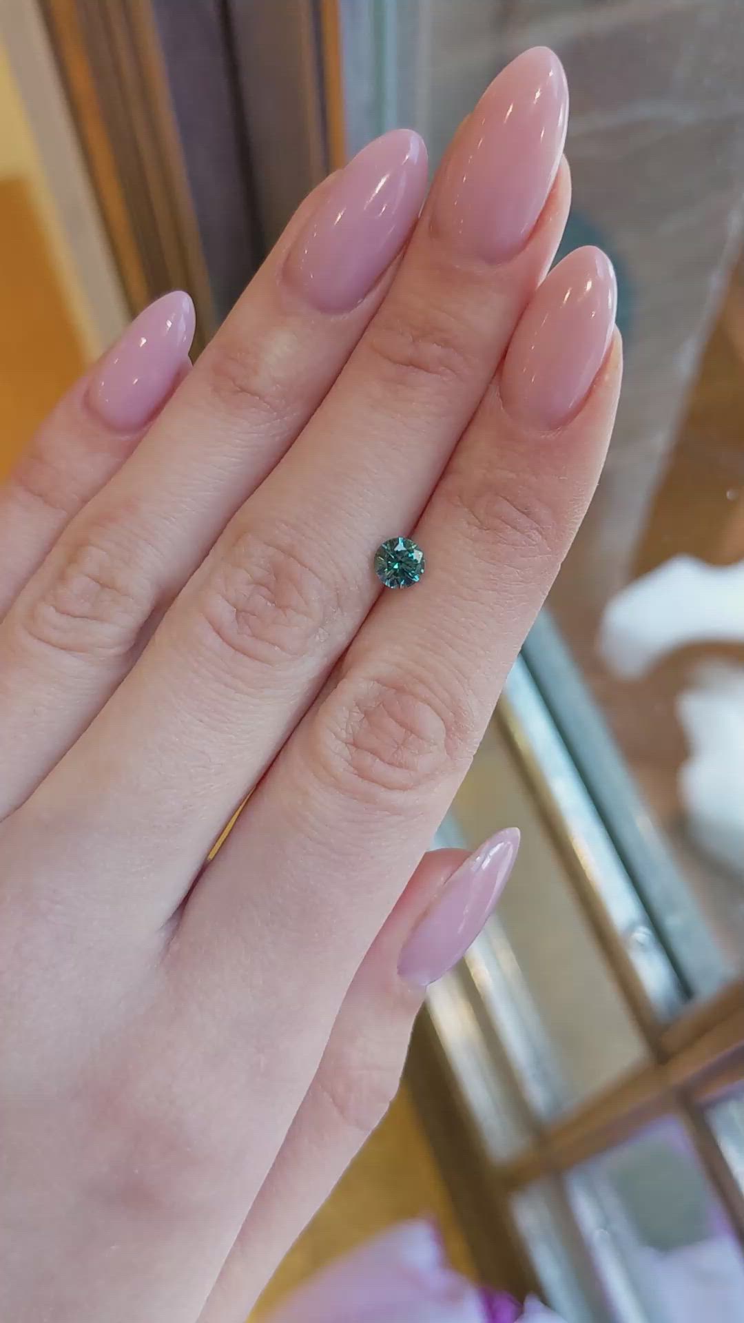 0.90 Ct. Bluish Green Sapphire from Montana Size Video