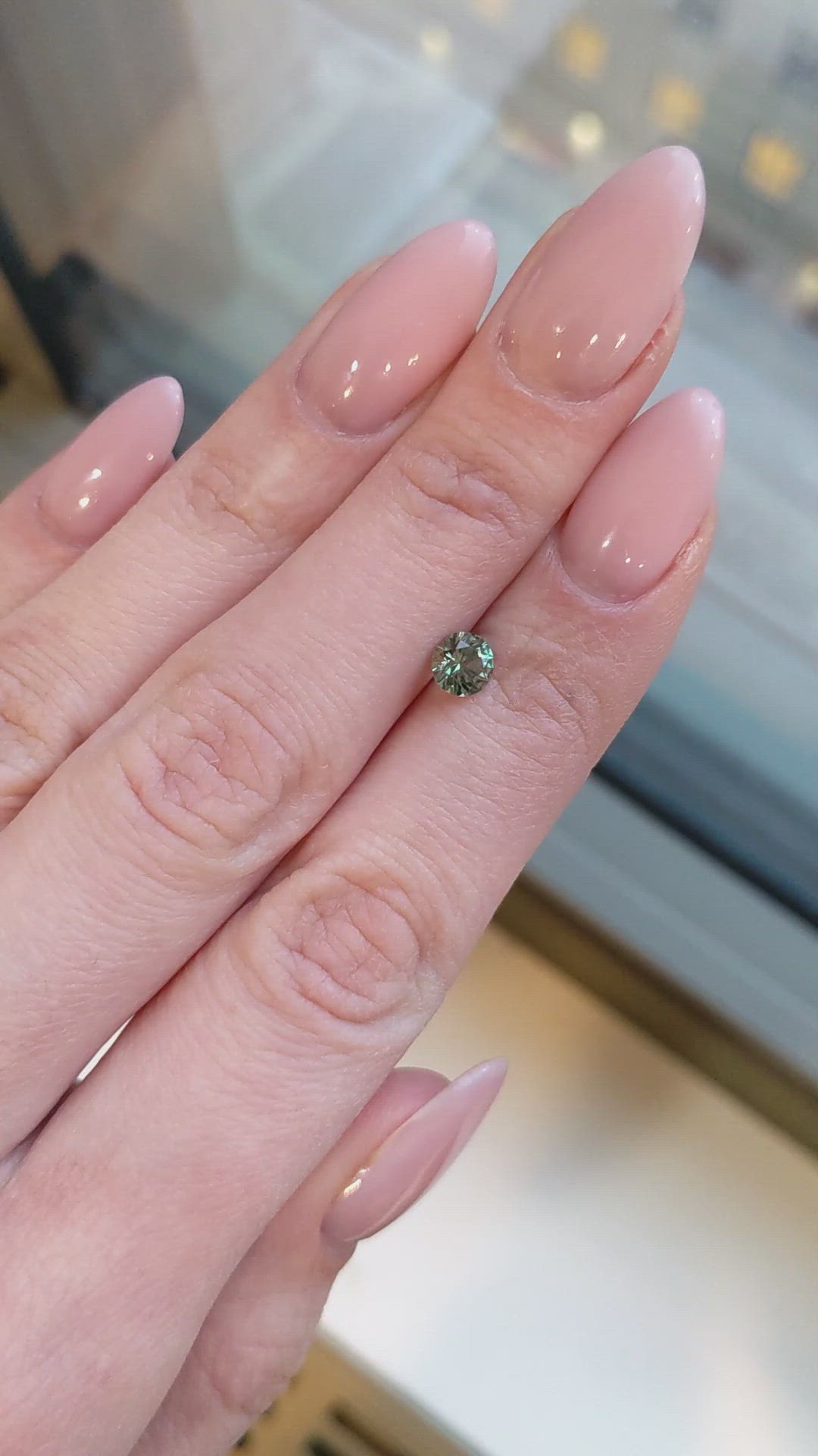 0.77 Ct. Yellowish Green Sapphire from Montana Size Video