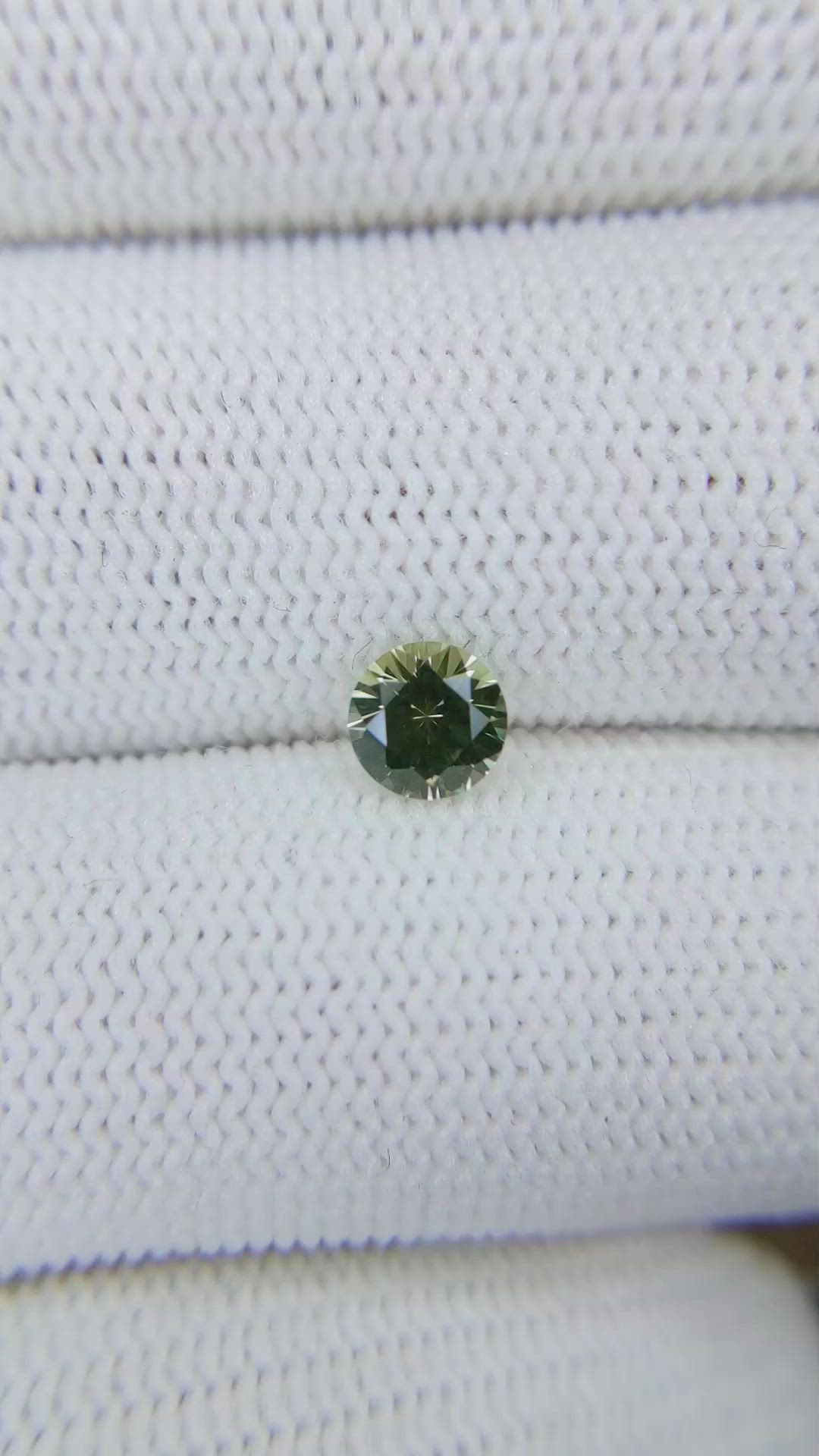0.77 Ct. Yellowish Green Sapphire from Montana Size Video