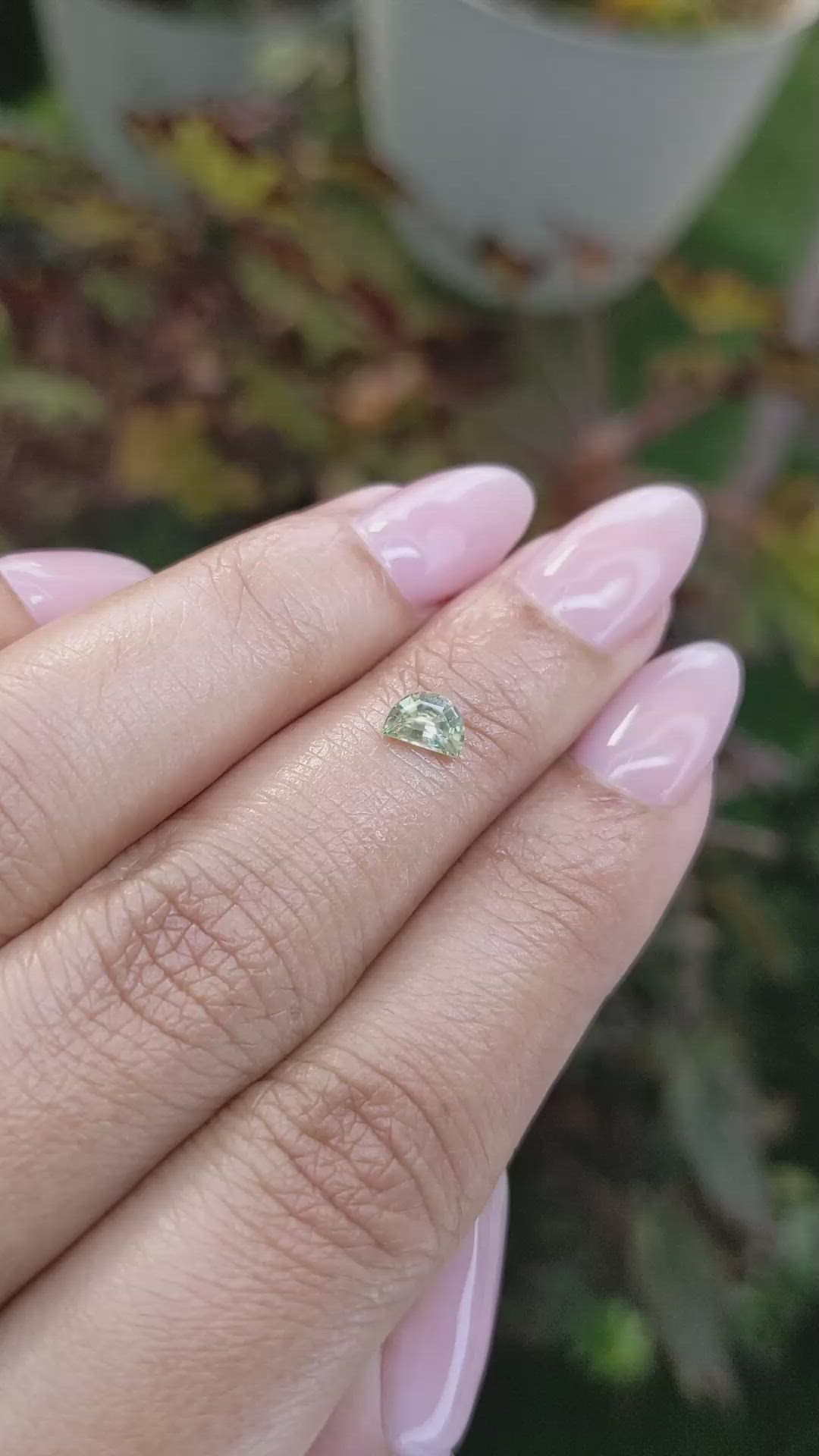 0.49 Ct. Yellowish Green Sapphire from Madagascar Size Video