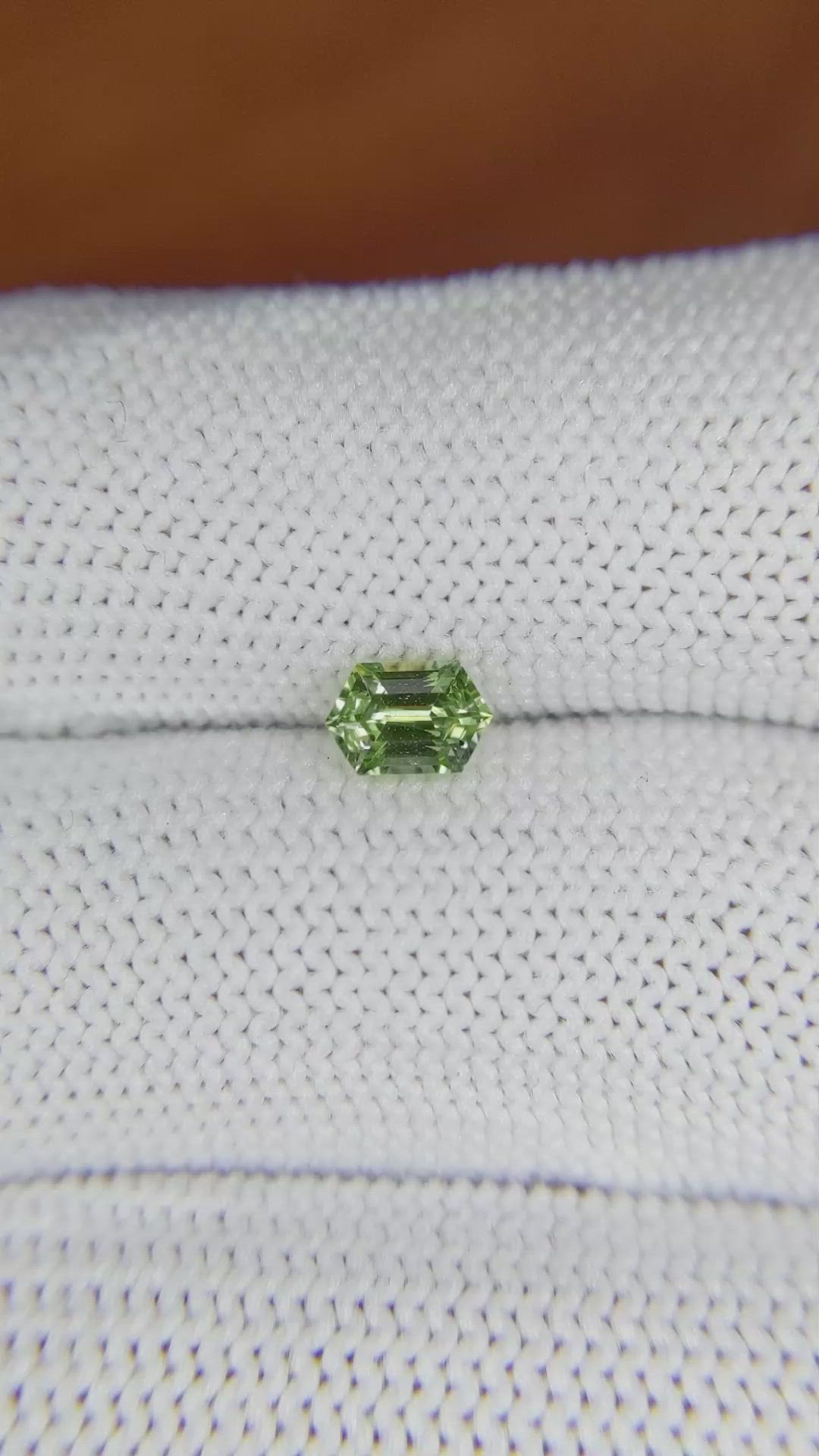 0.62 Ct. Yellowish Green Sapphire from Madagascar Size Video