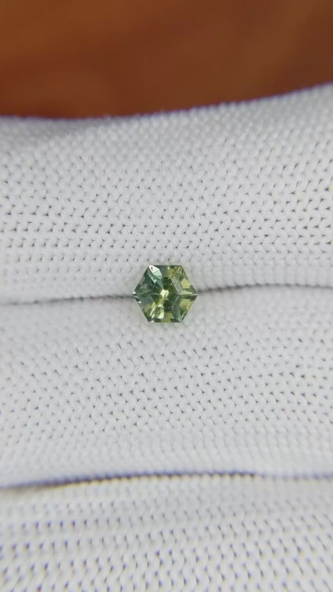 0.75 Ct. Yellowish Green Sapphire from Madagascar Size Video