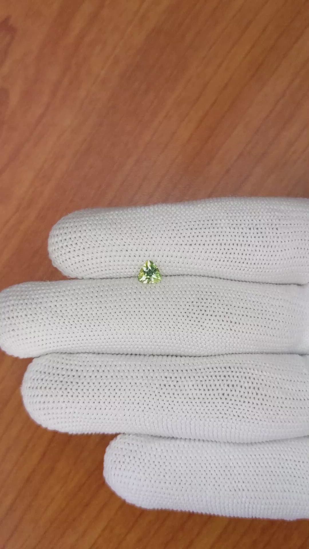 0.44 Ct. Yellowish Green Sapphire from Ceylon (Sri Lanka) Size Video