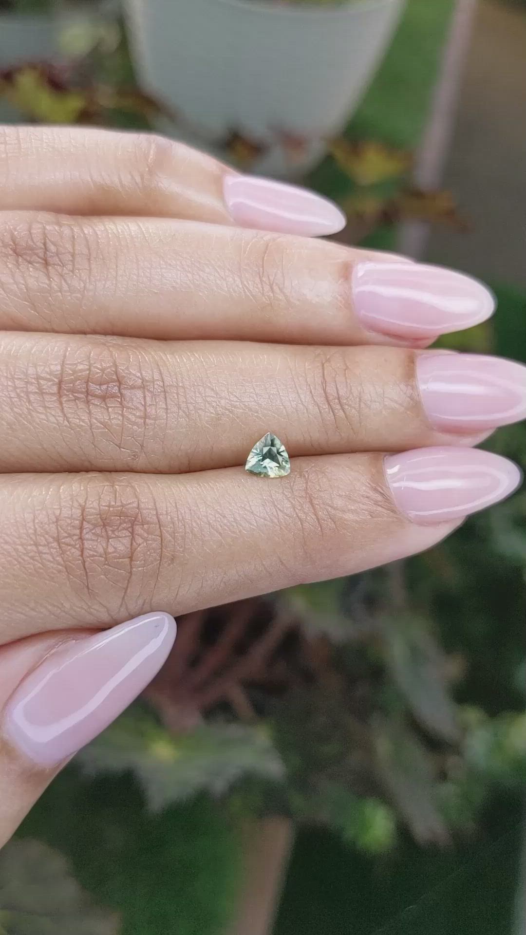 0.44 Ct. Yellowish Green Sapphire from Ceylon (Sri Lanka) Size Video
