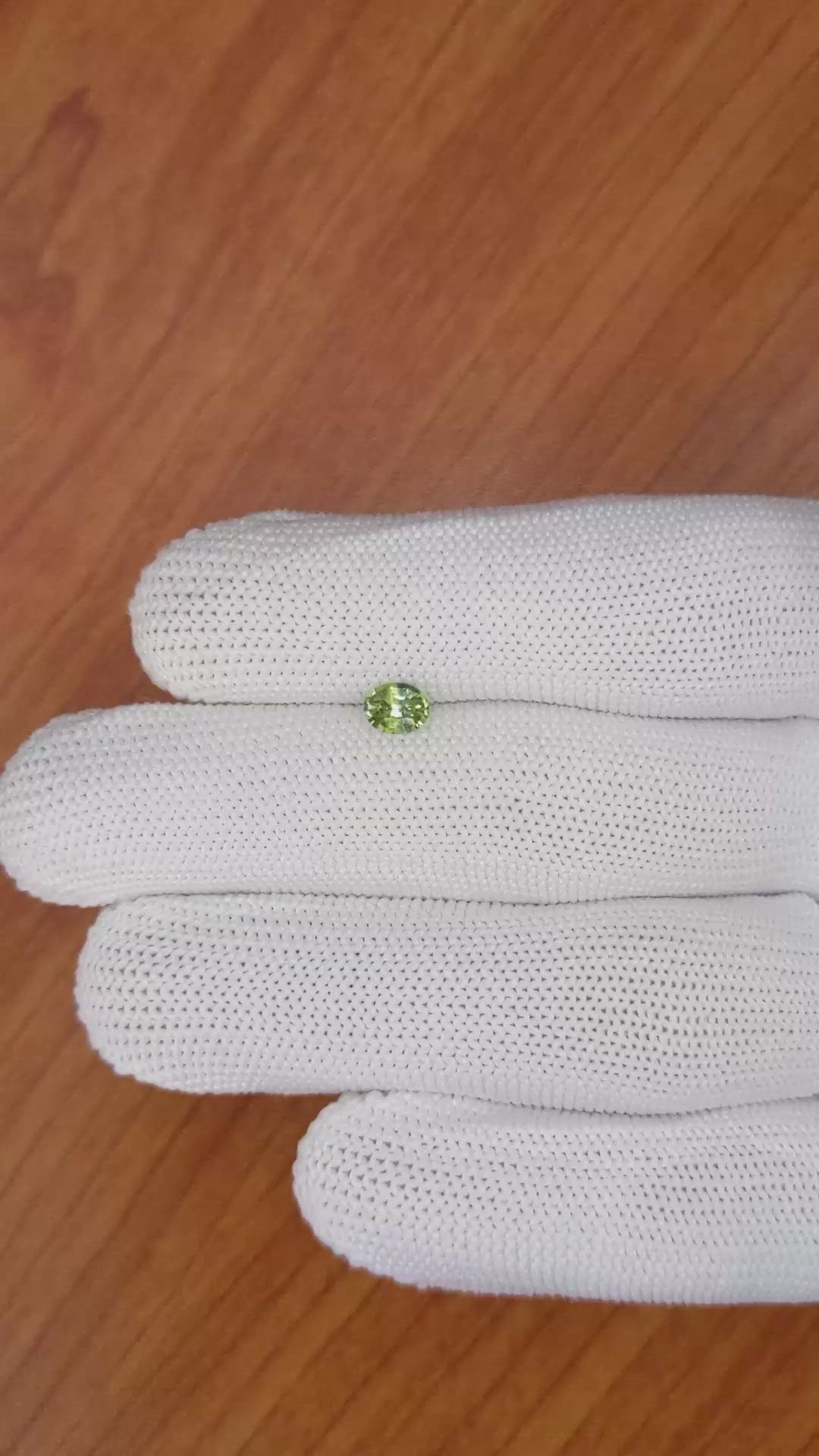 0.54 Ct. Greenish Yellow Sapphire from Madagascar Size Video