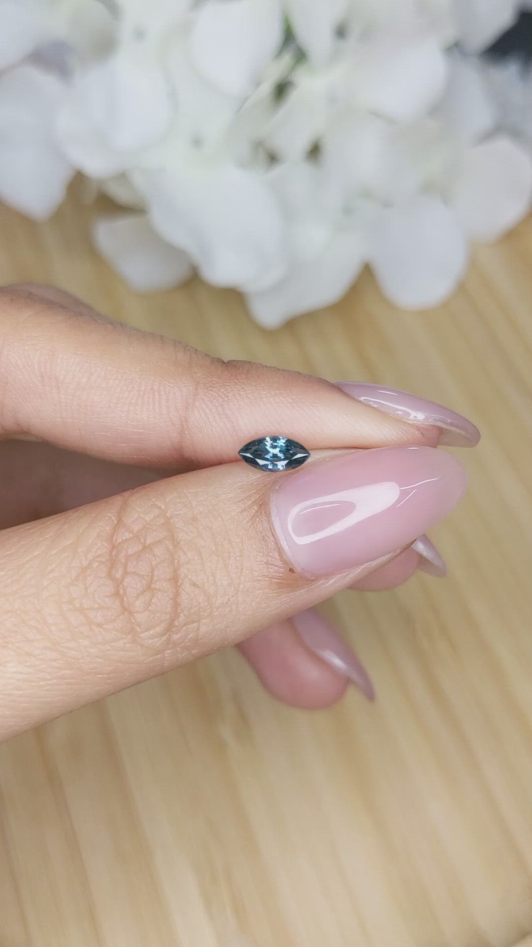 0.59 Ct. Greenish Blue Sapphire from Madagascar Size Video