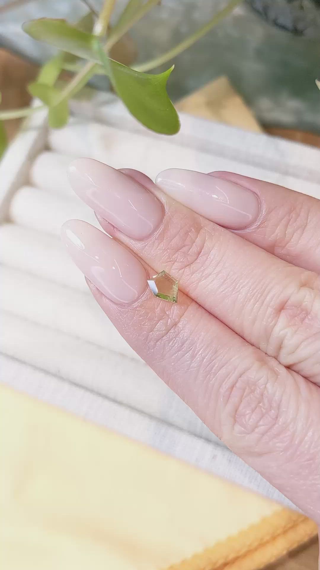 0.77 Ct. Yellowish Green Sapphire from Montana Size Video