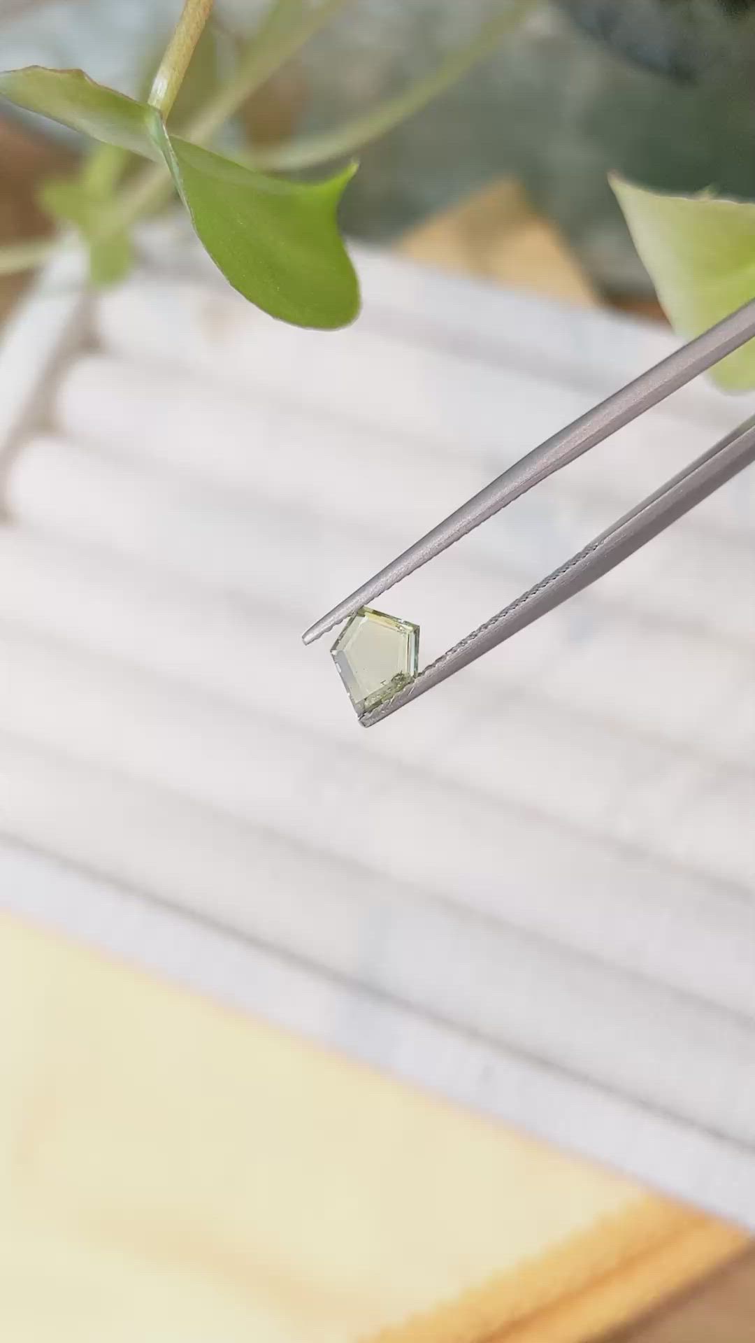 0.77 Ct. Yellowish Green Sapphire from Montana Size Video