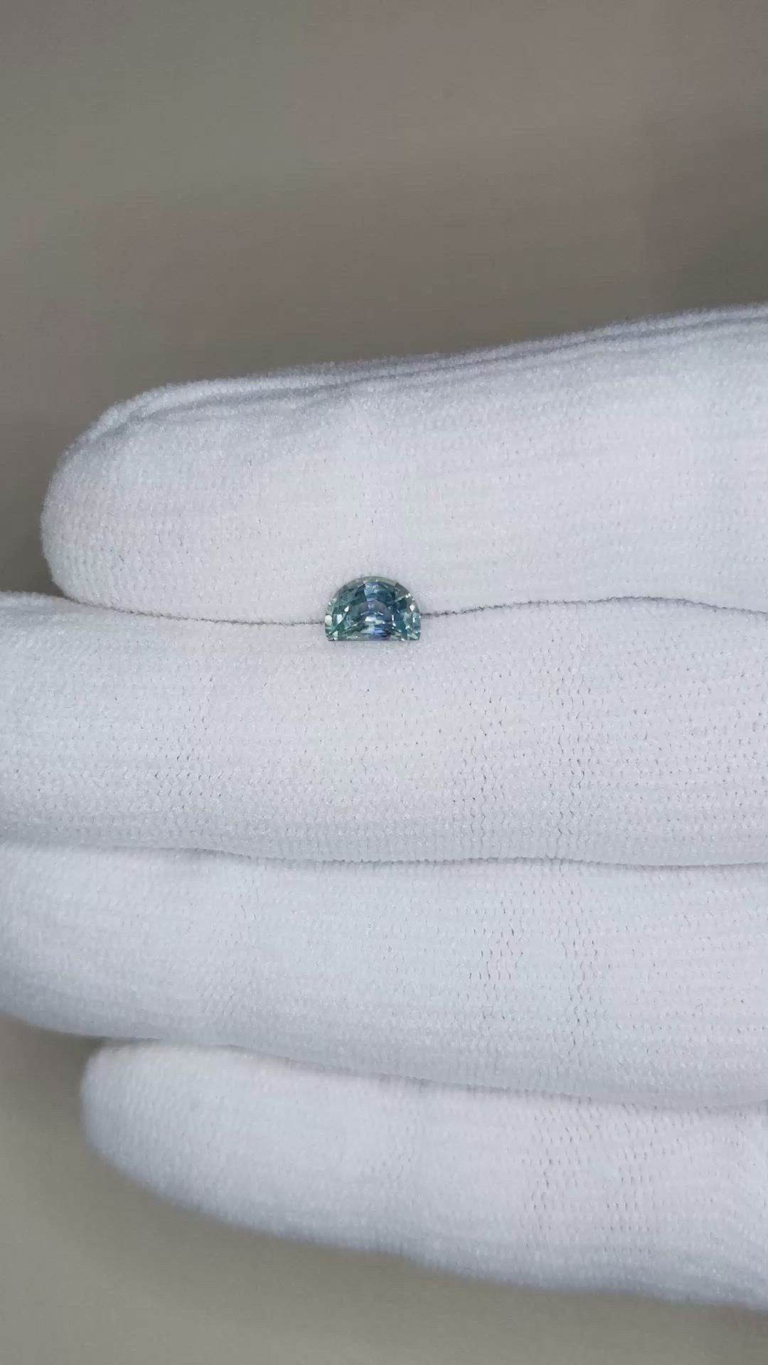 0.76 Ct. Bluish Green Sapphire from Montana Size Video