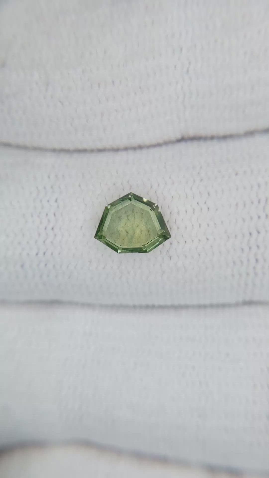 0.90 Ct. Yellowish Green Sapphire from Montana Size Video