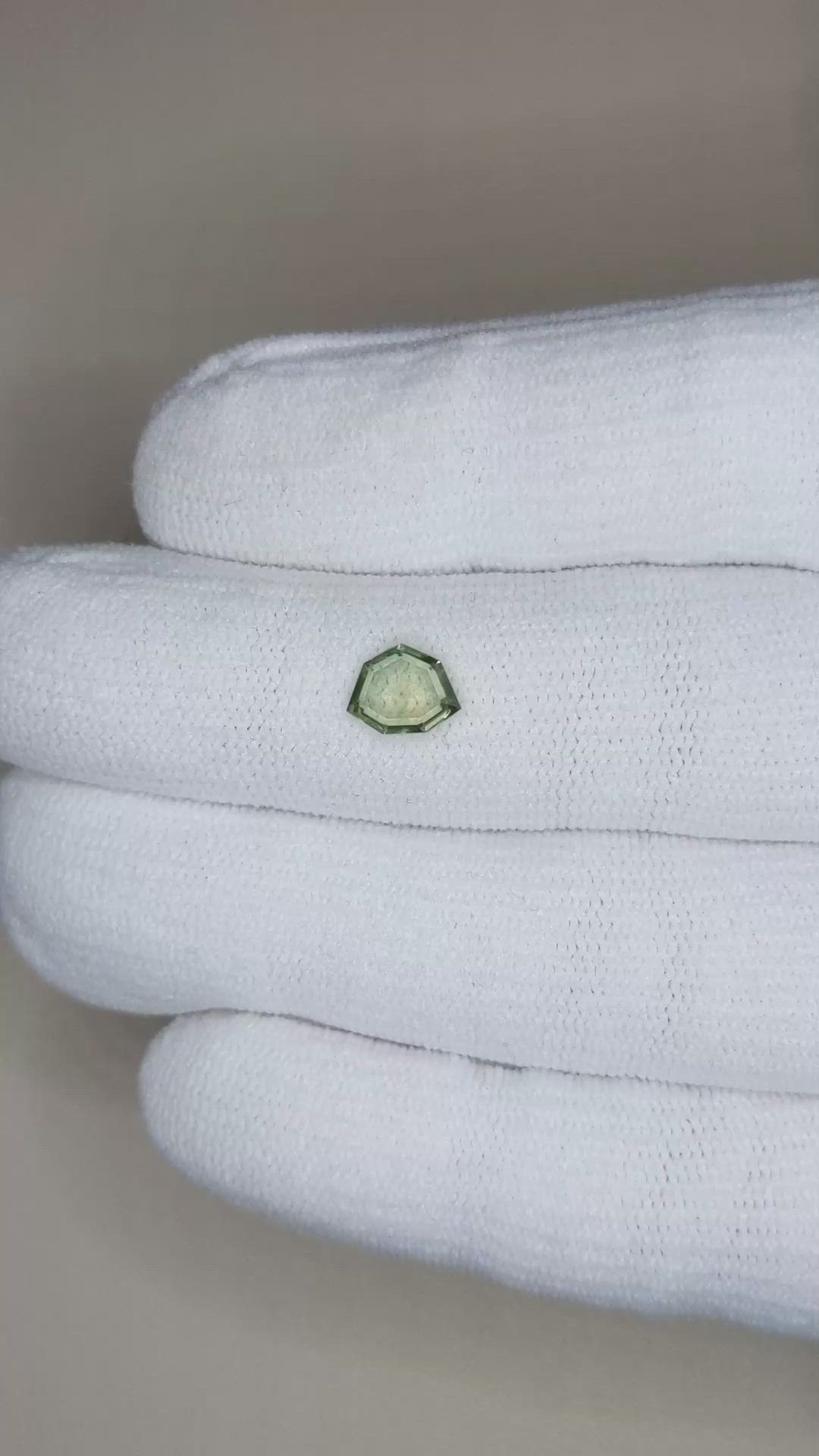 0.90 Ct. Yellowish Green Sapphire from Montana Size Video