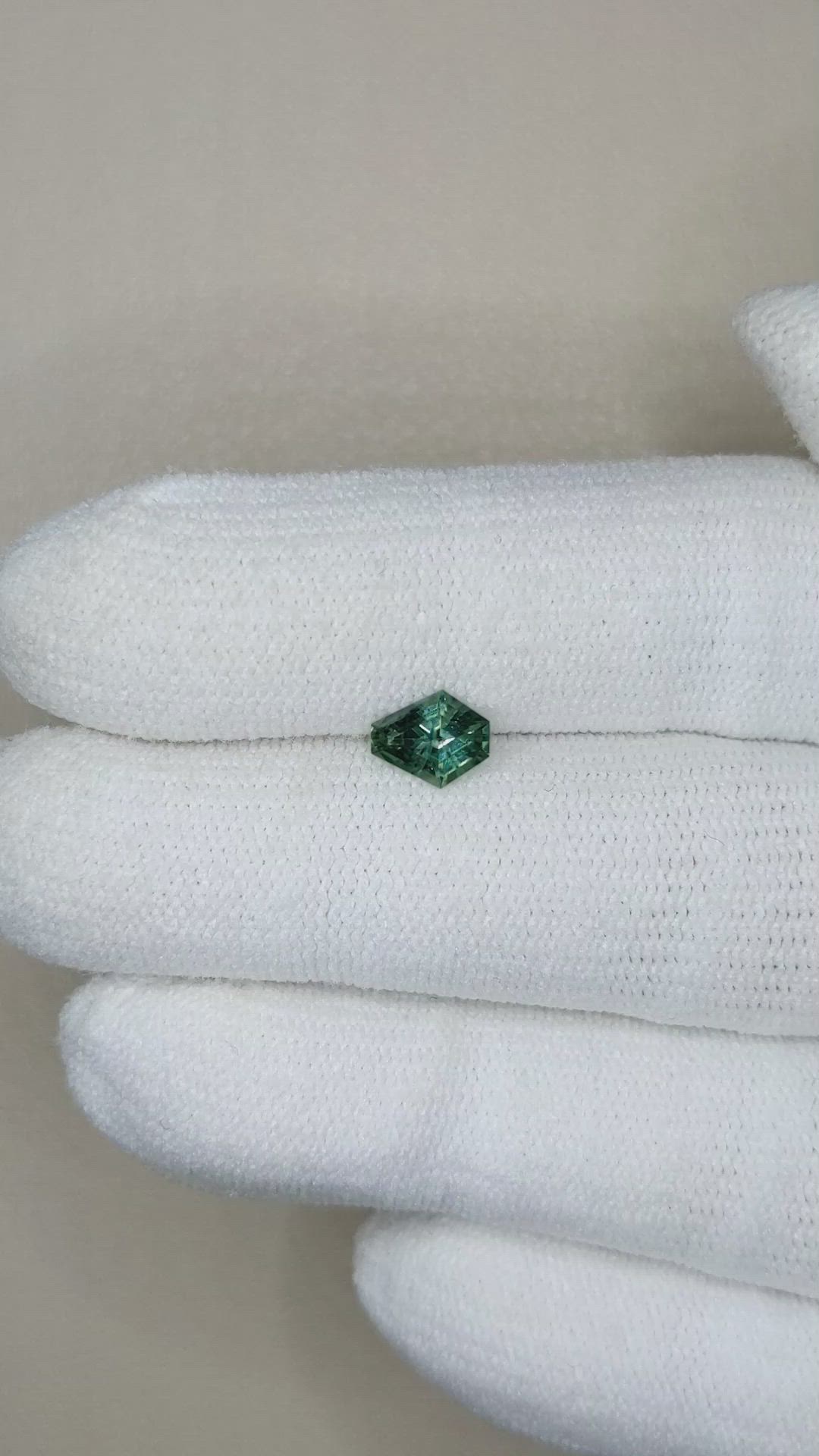 0.68 Ct. Bluish Green Sapphire from Montana Size Video