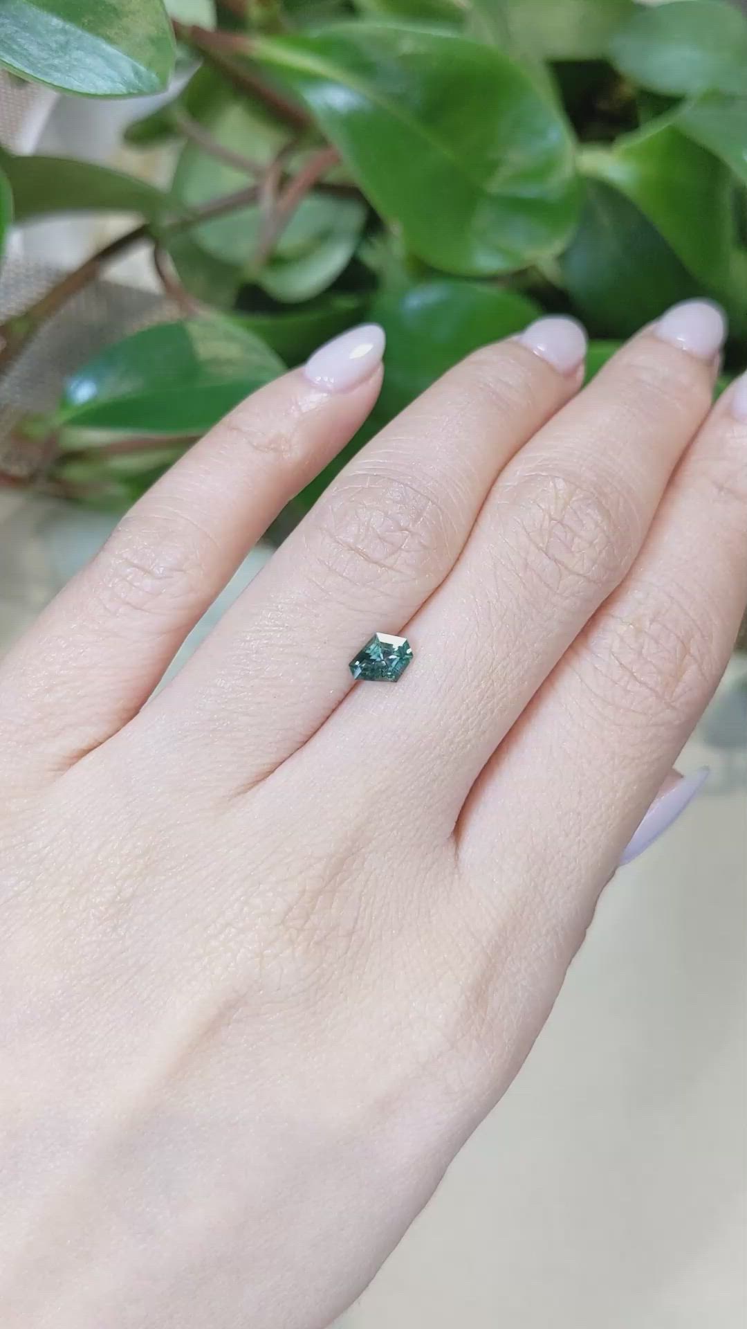 0.68 Ct. Bluish Green Sapphire from Montana Size Video